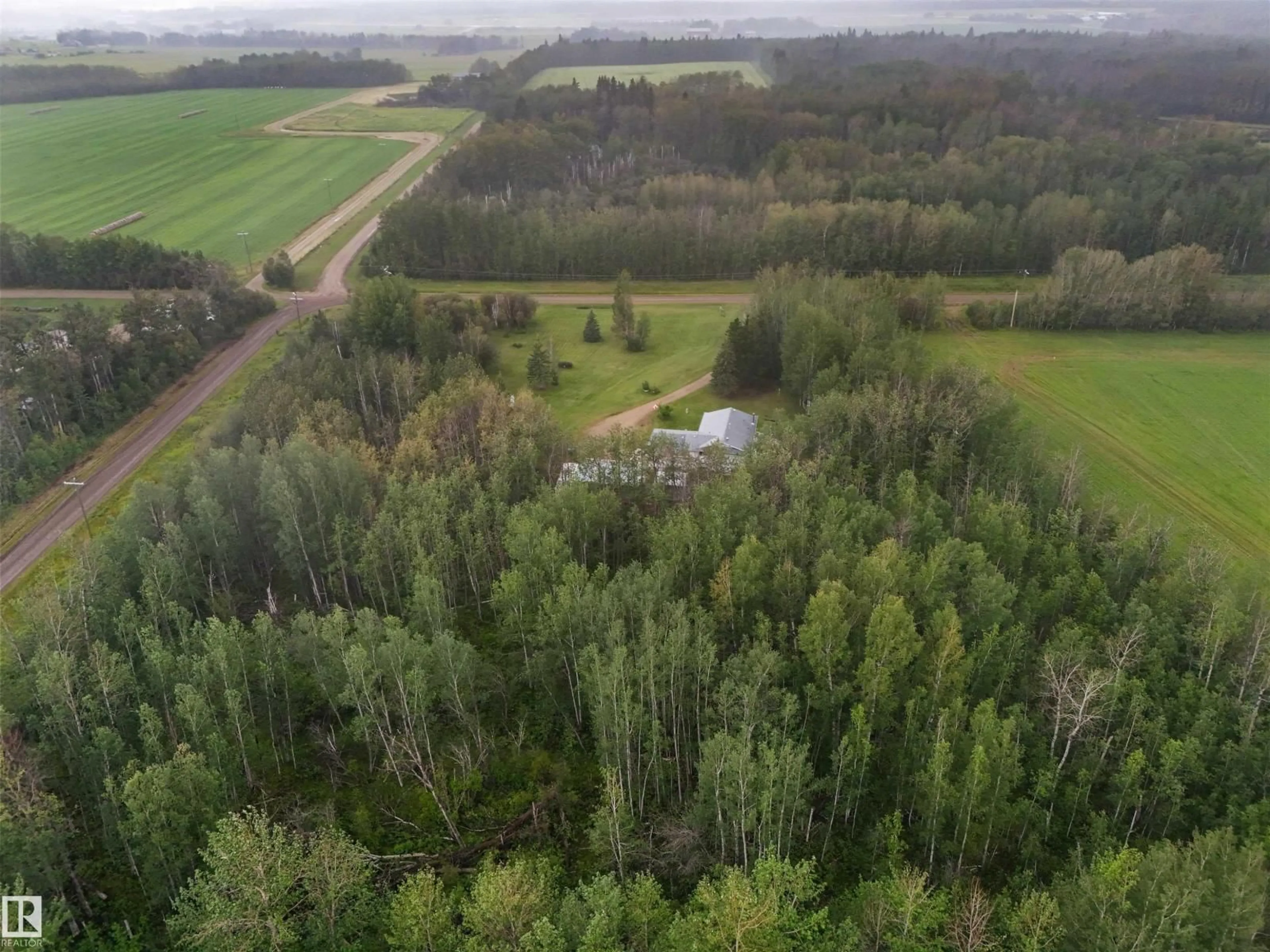 A pic from outside/outdoor area/front of a property/back of a property/a pic from drone, forest/trees view for 49419 RGE ROAD 72, Rural Brazeau County Alberta T7A1R9