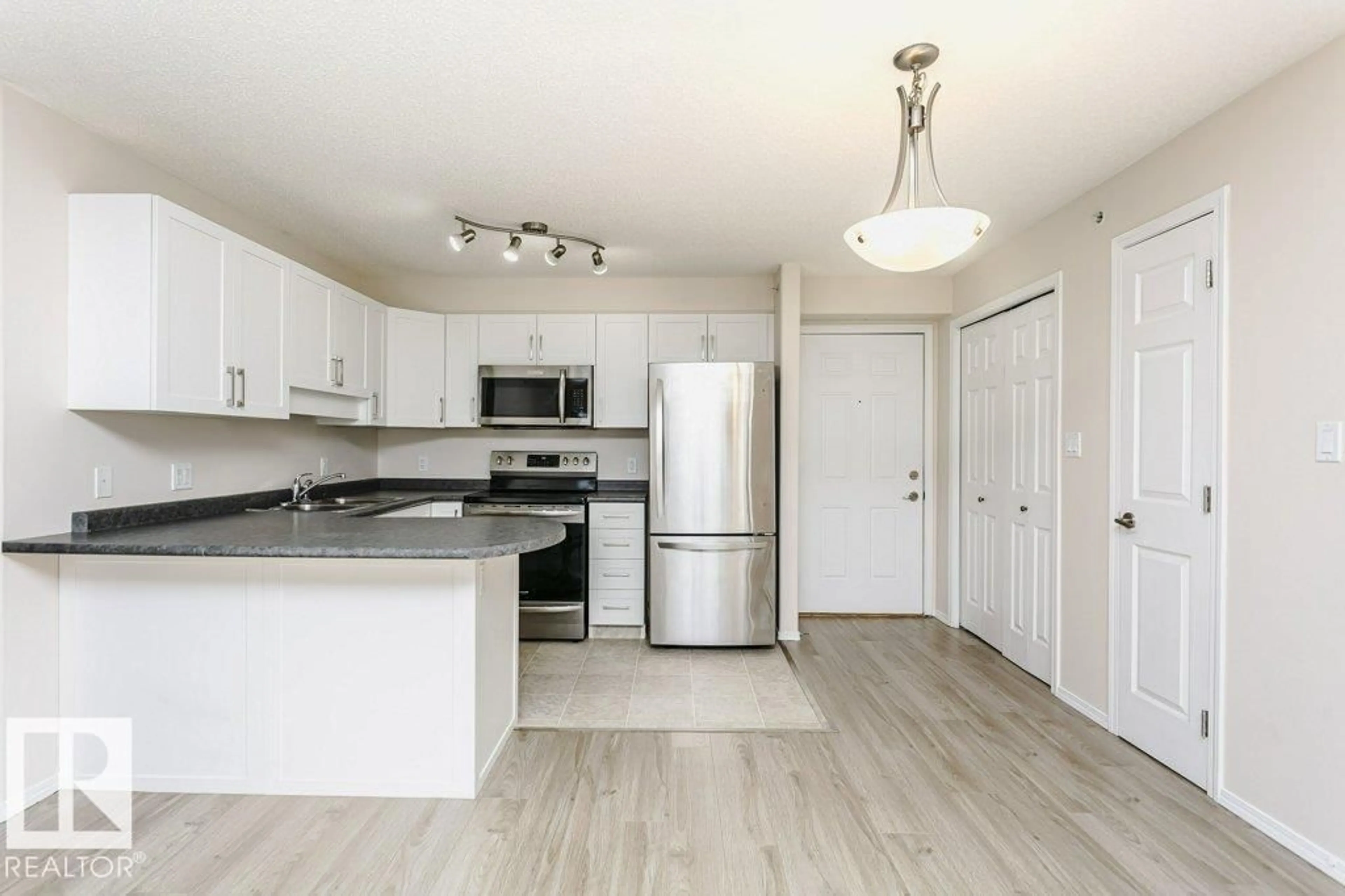 Standard kitchen, wood/laminate floor for 423 13625 34 ST NW, Edmonton Alberta T5A0E3