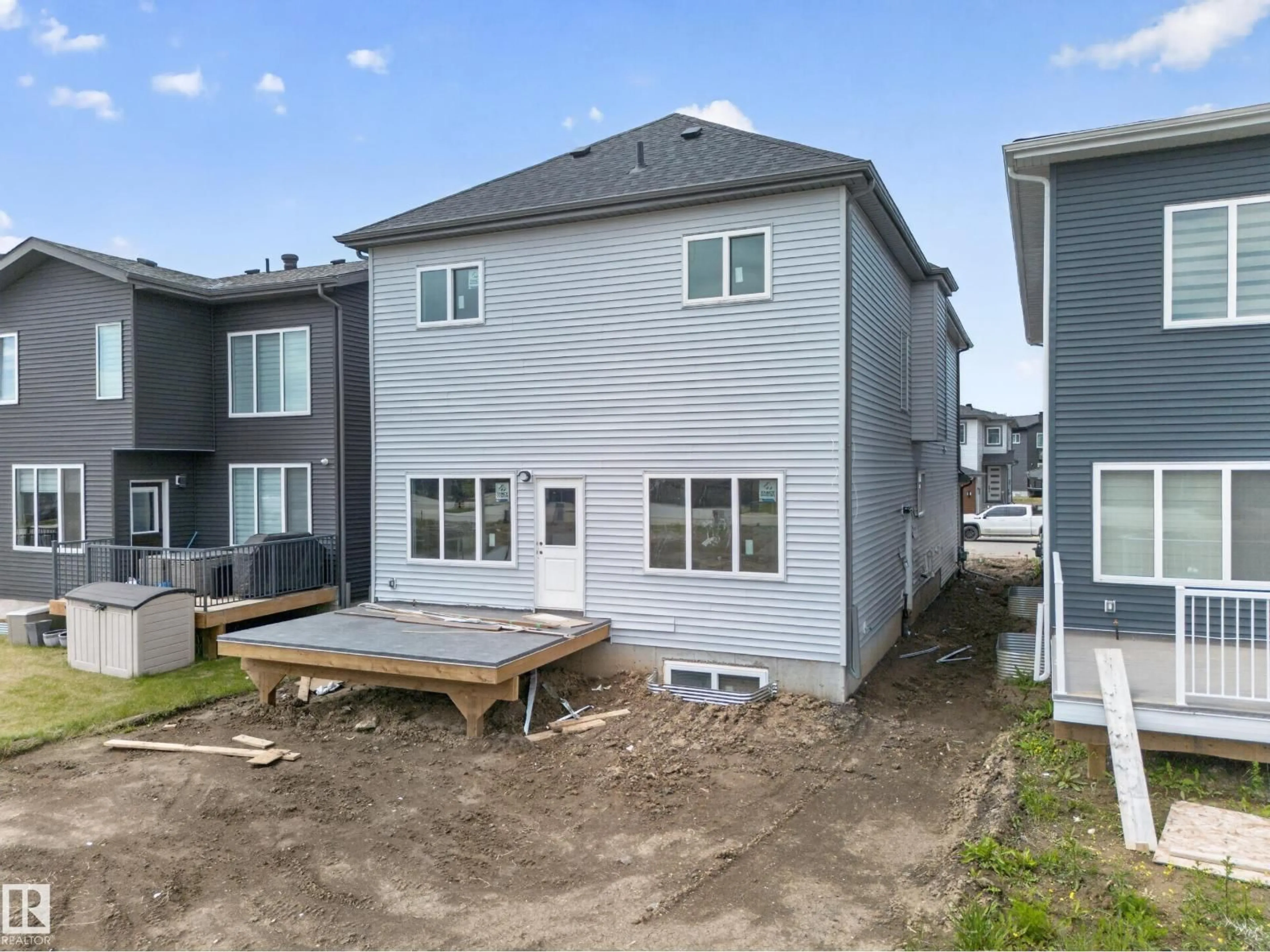 A pic from outside/outdoor area/front of a property/back of a property/a pic from drone, unknown for 8915 MAYDAY WY, Edmonton Alberta T6X3E9