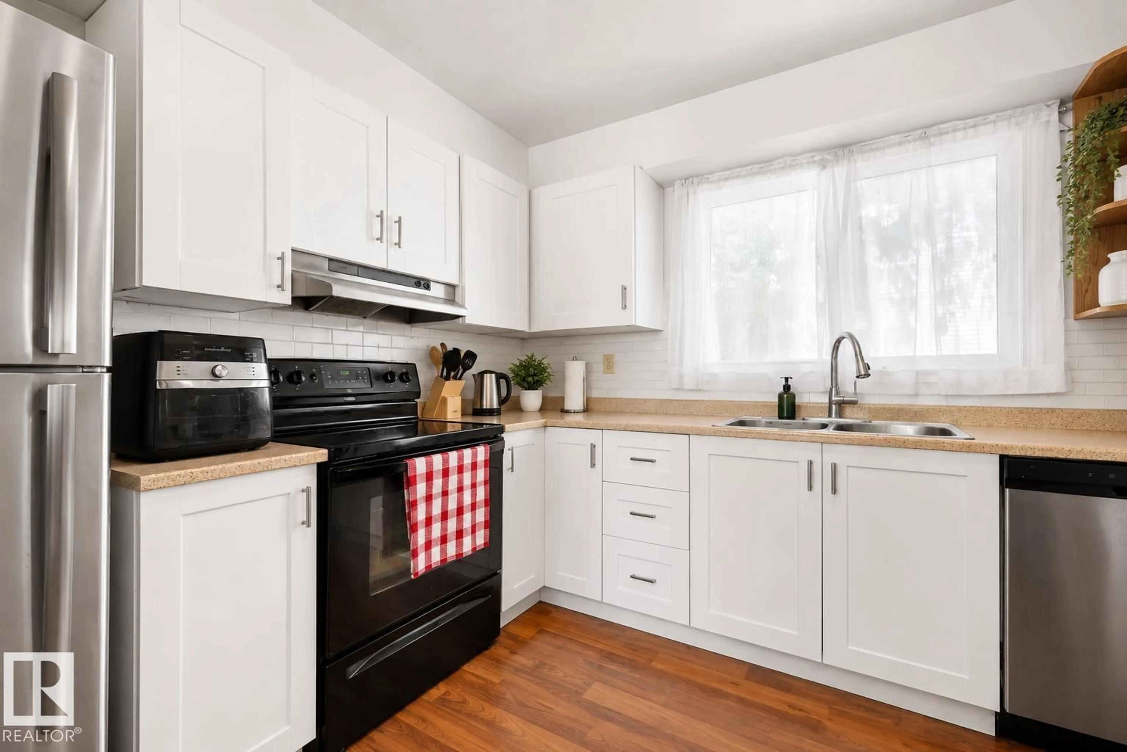 Standard kitchen, wood/laminate floor for #44 - 1415 62 ST, Edmonton Alberta T6L4K1