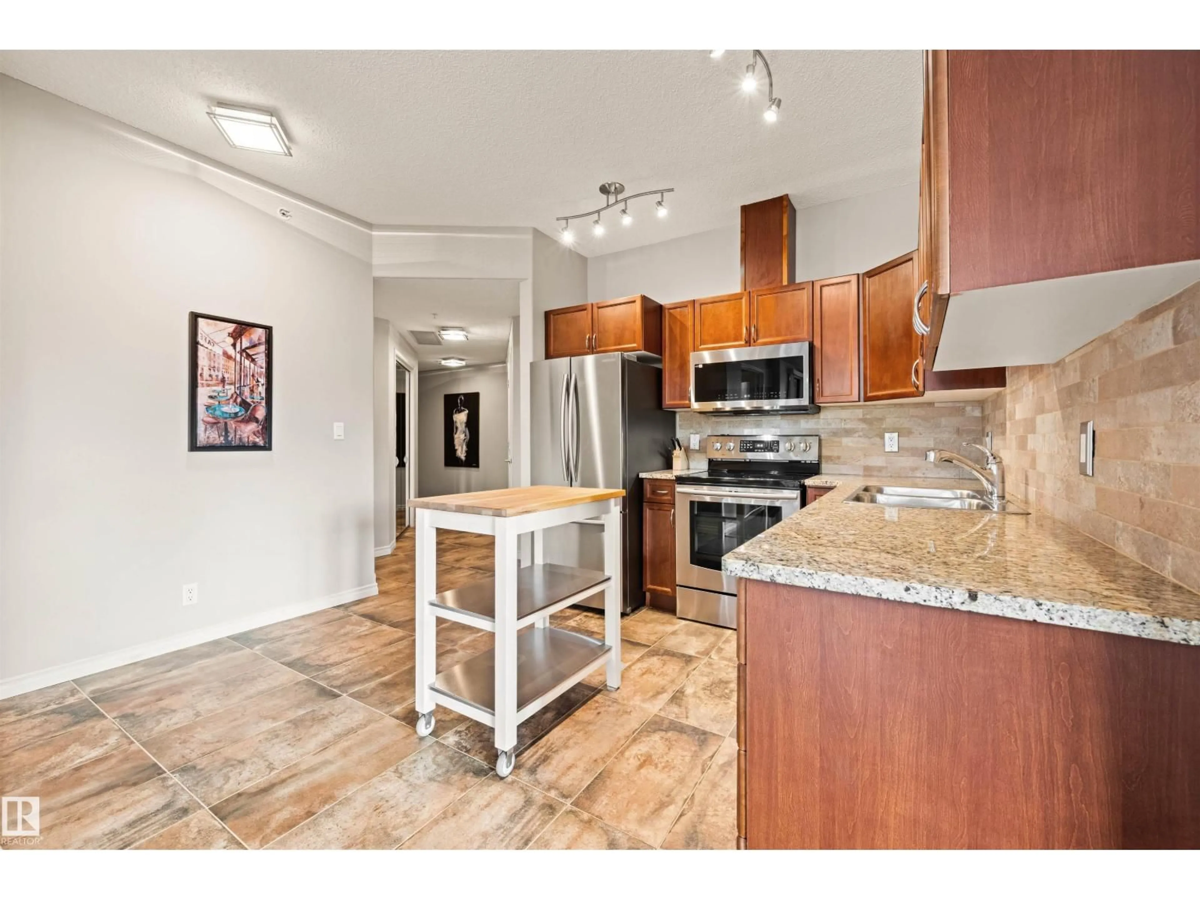 Open concept kitchen, ceramic/tile floor for 904 - 10319 111 ST, Edmonton Alberta T5K0A2
