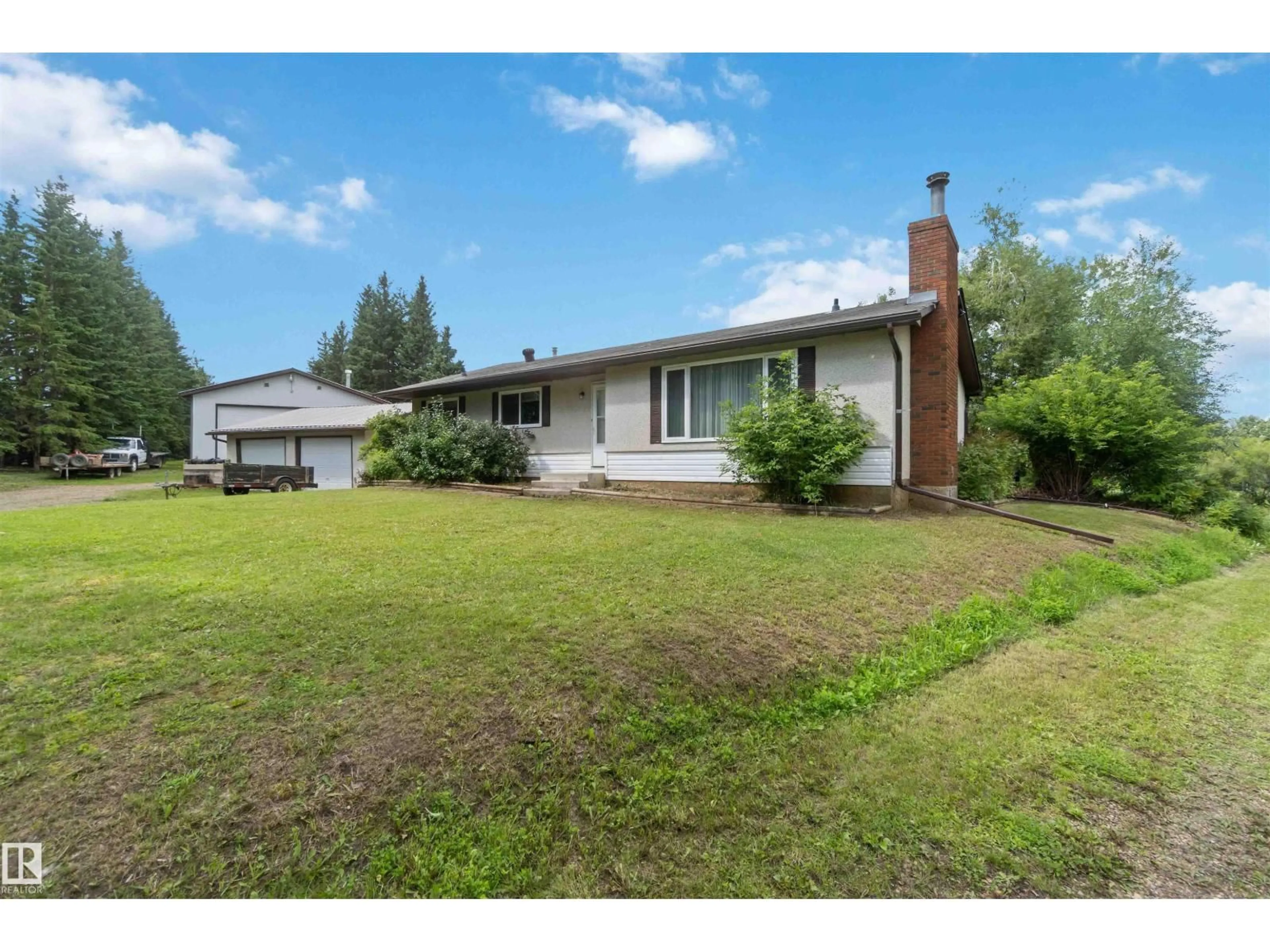 A pic from outside/outdoor area/front of a property/back of a property/a pic from drone, street for 53305 - 116 RGE ROAD 280, Rural Parkland County Alberta T7X3V7
