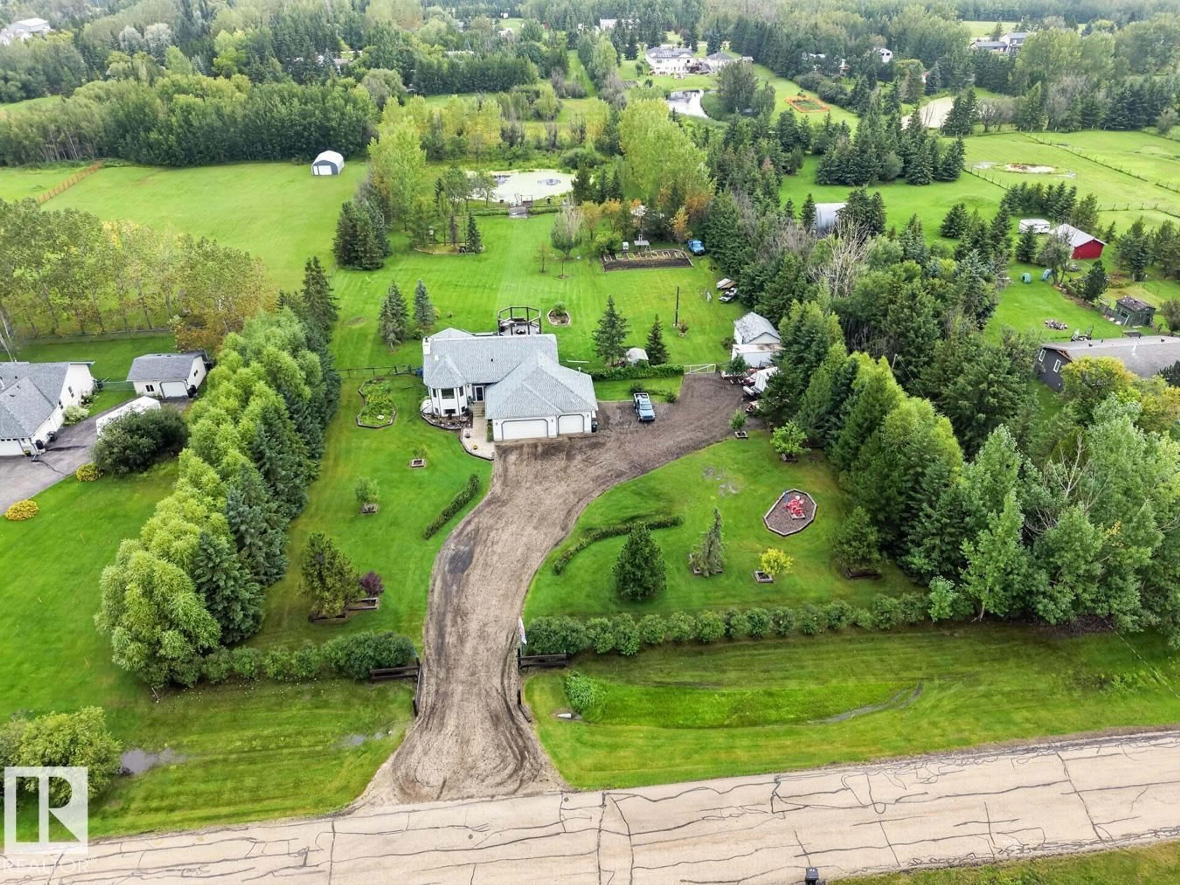 A pic from outside/outdoor area/front of a property/back of a property/a pic from drone, unknown for 52349 - 110 RGE ROAD 222 RGE ROAD, Rural Strathcona County Alberta T8C1A5