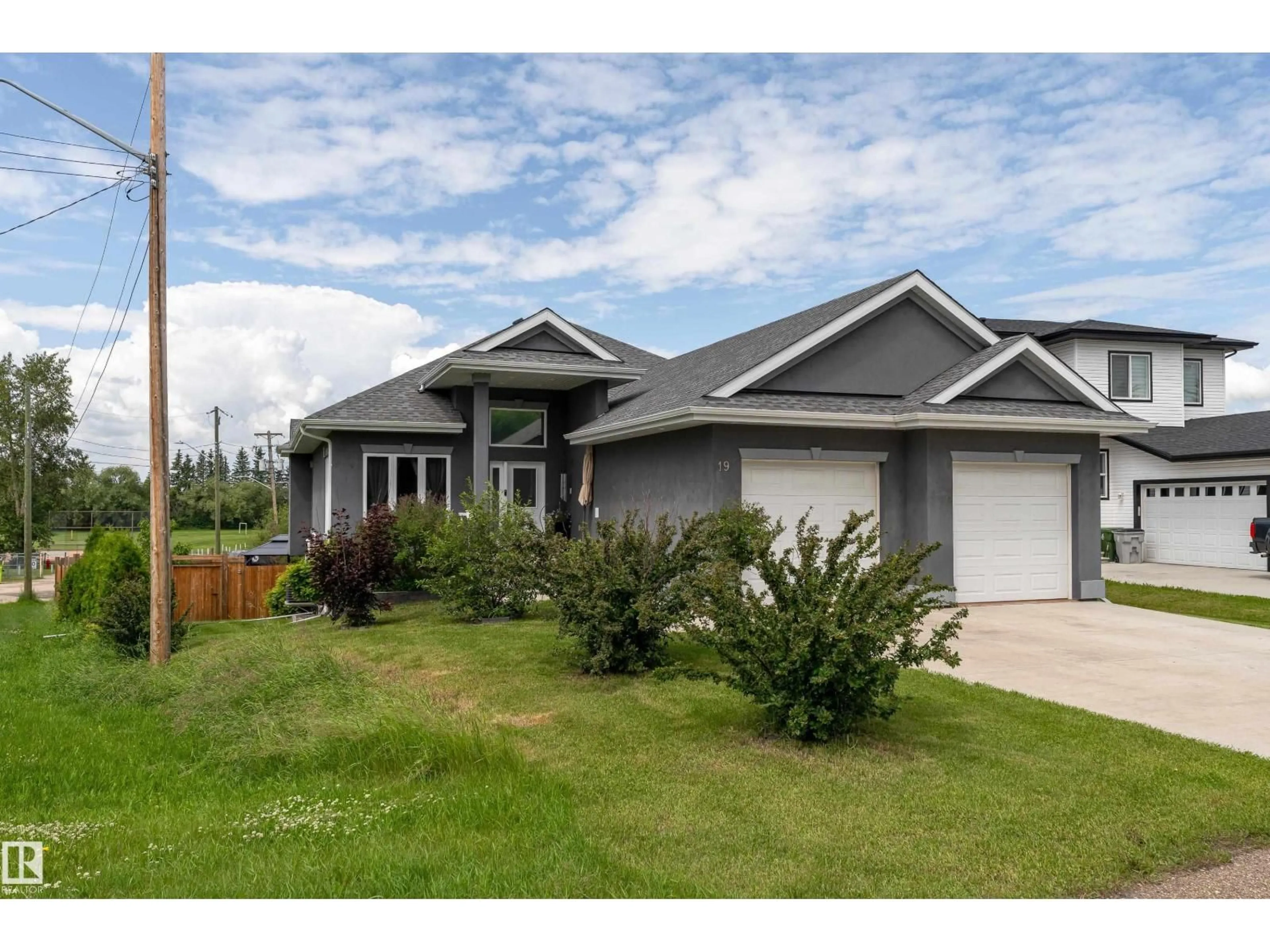 Home with vinyl exterior material, street for 19B SPRUCE MEADOW LANE, Bon Accord Alberta T0A0K0
