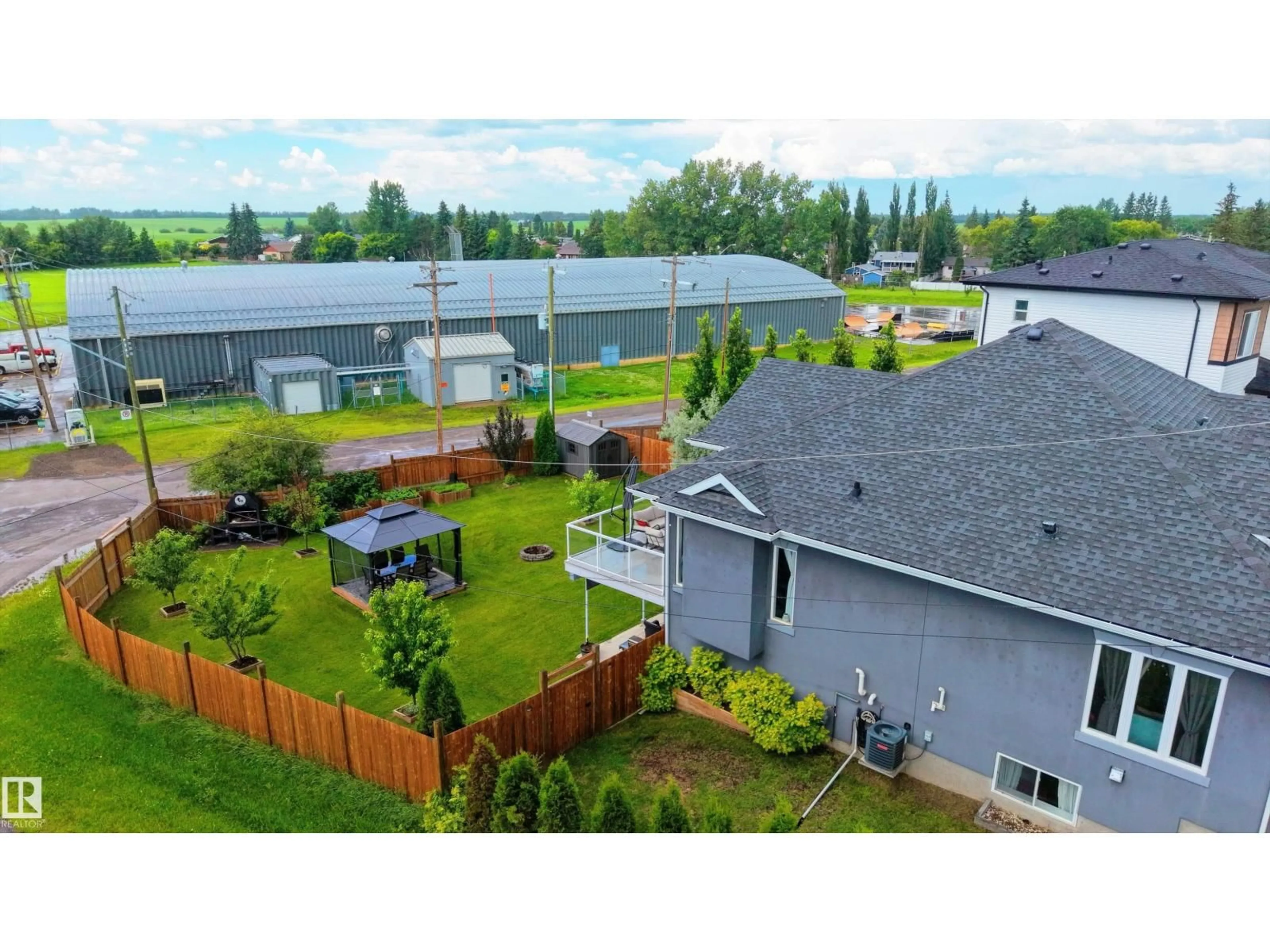 A pic from outside/outdoor area/front of a property/back of a property/a pic from drone, mountain view for 19B SPRUCE MEADOW LANE, Bon Accord Alberta T0A0K0