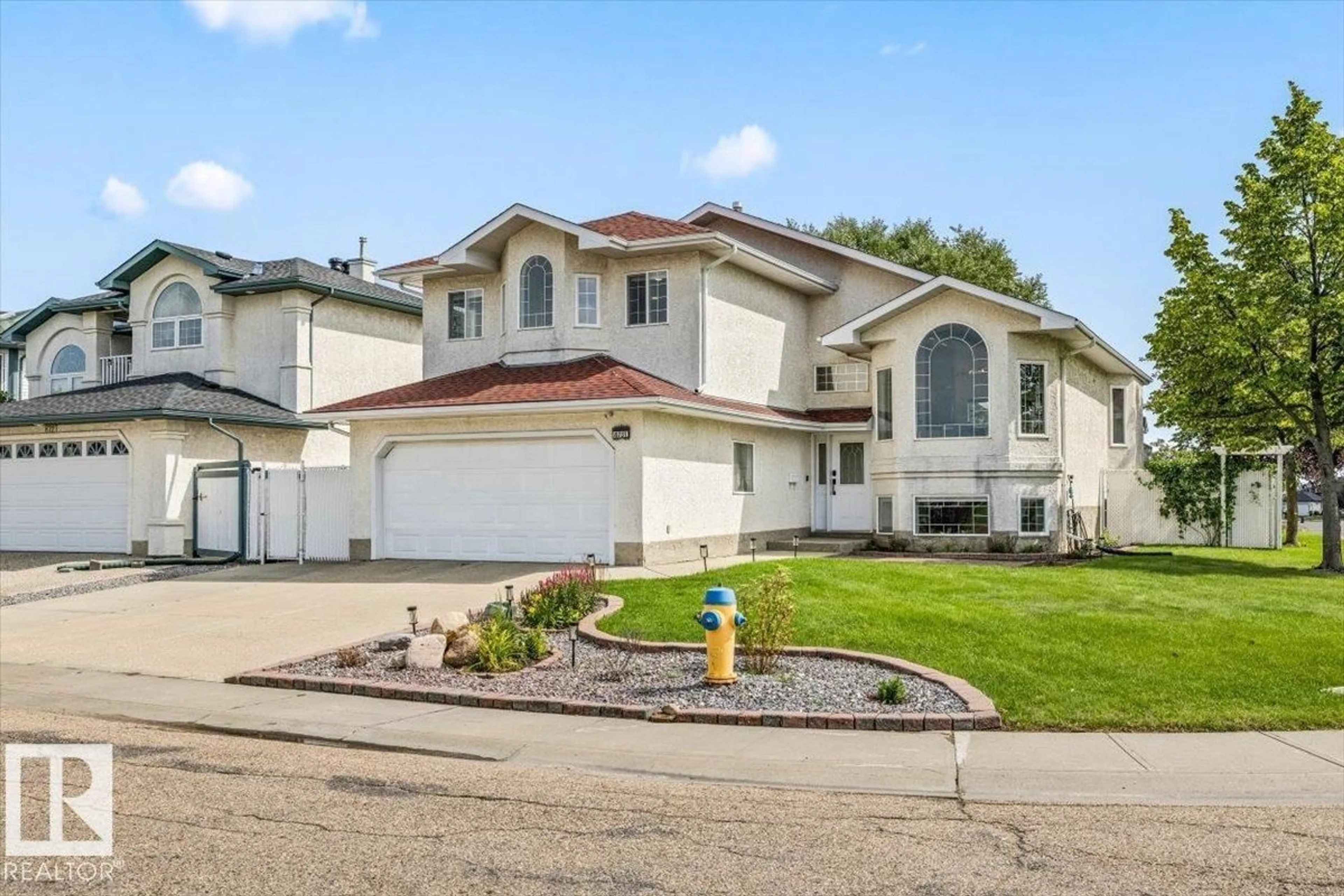 Home with vinyl exterior material, street for 8731 160A AV, Edmonton Alberta T5Z3K4
