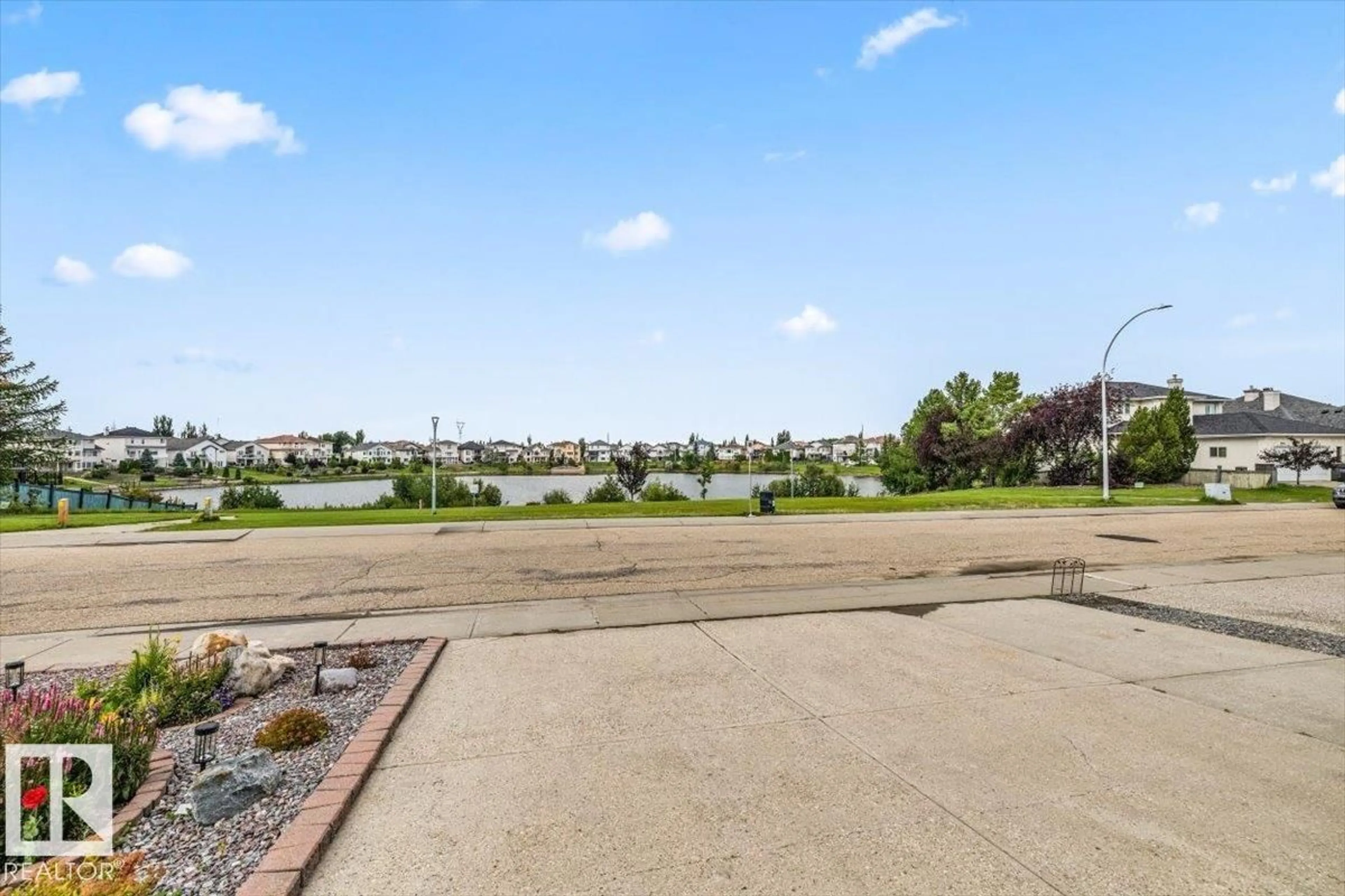 A pic from outside/outdoor area/front of a property/back of a property/a pic from drone, water/lake/river/ocean view for 8731 160A AV, Edmonton Alberta T5Z3K4
