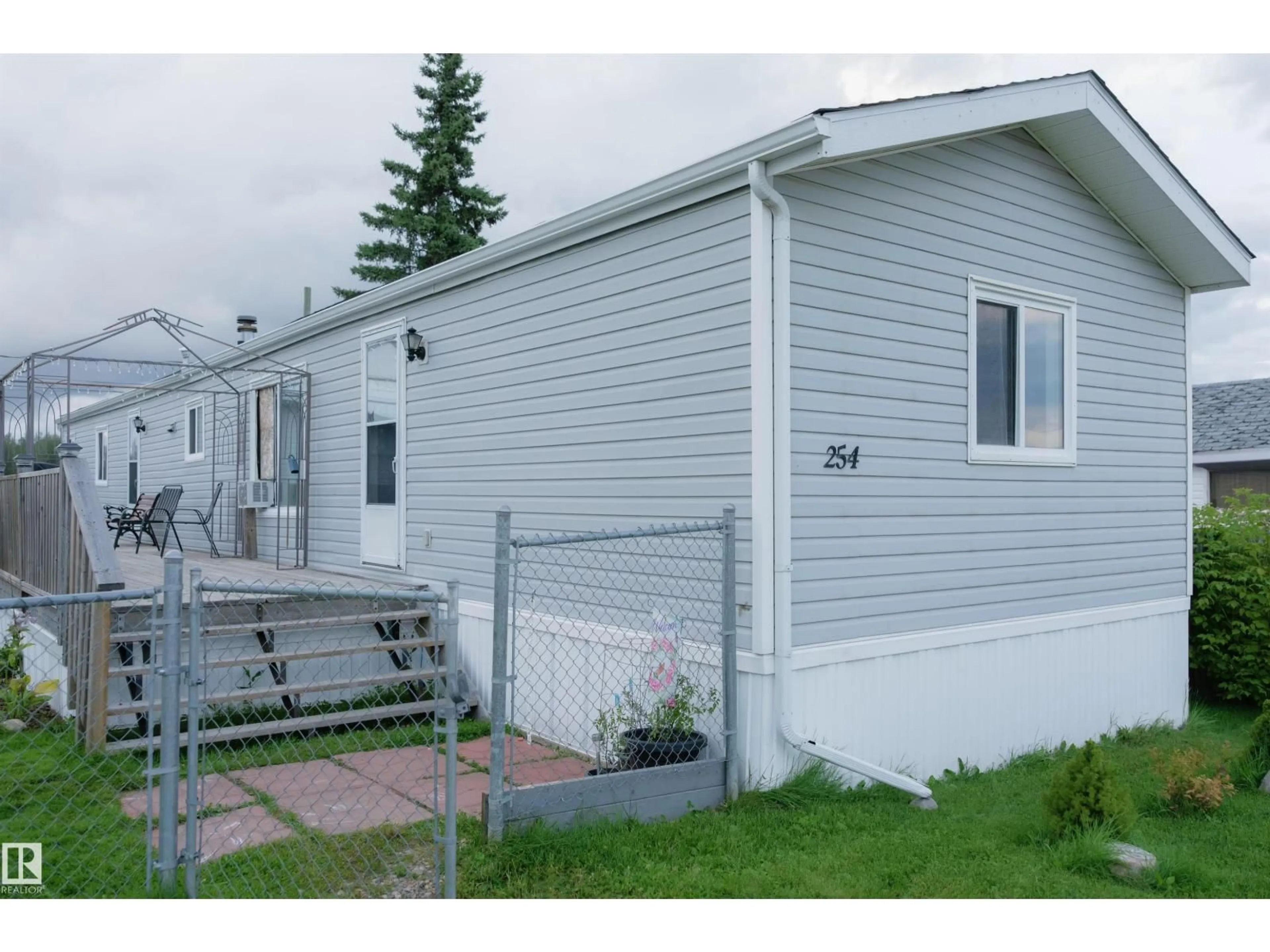 Home with vinyl exterior material, street for 80 - 254 49231 RR, Rural Brazeau County Alberta T7A1L7