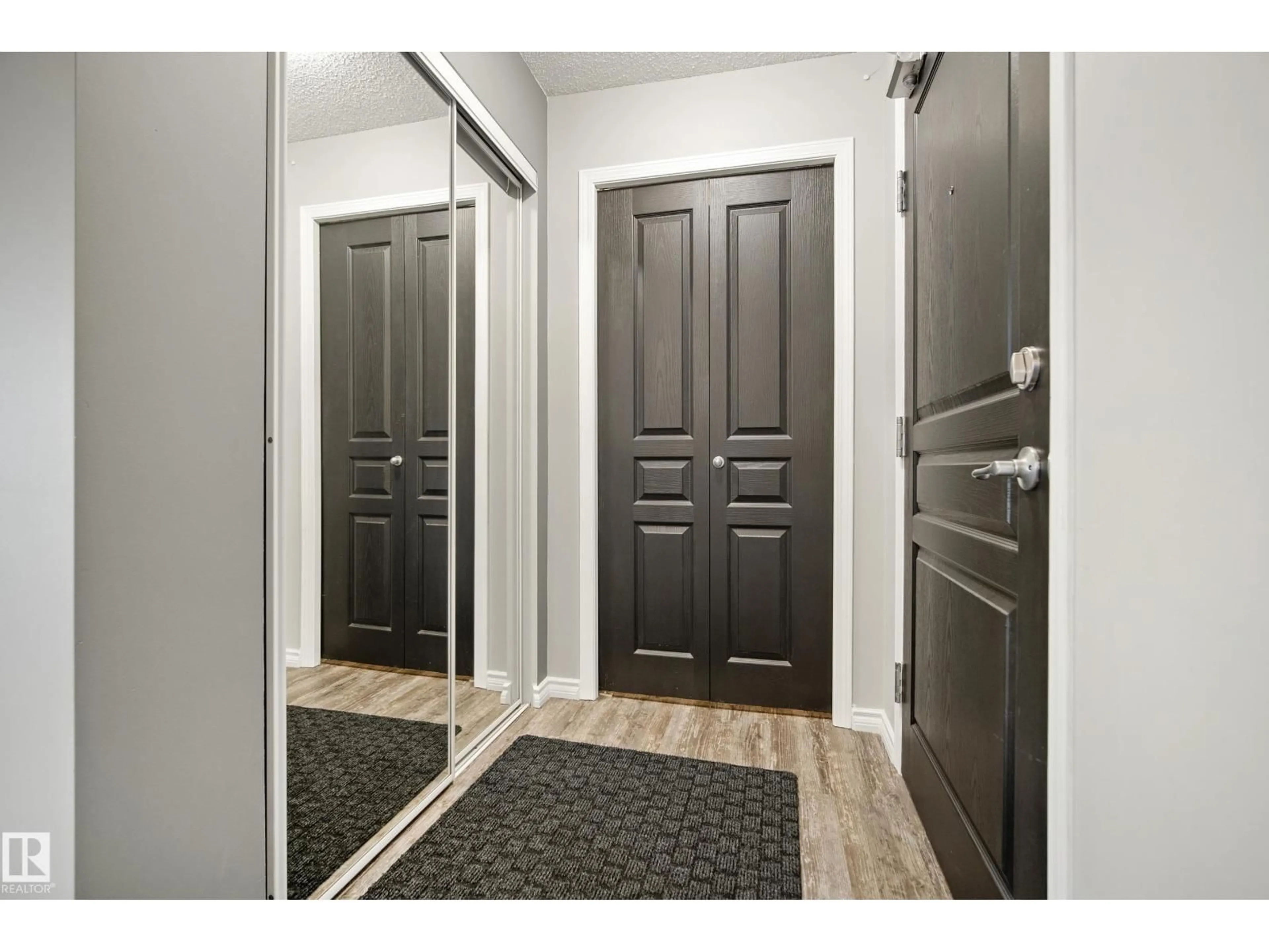 Indoor entryway for 340 2436 GUARDIAN RD, Edmonton Alberta T5T2P5