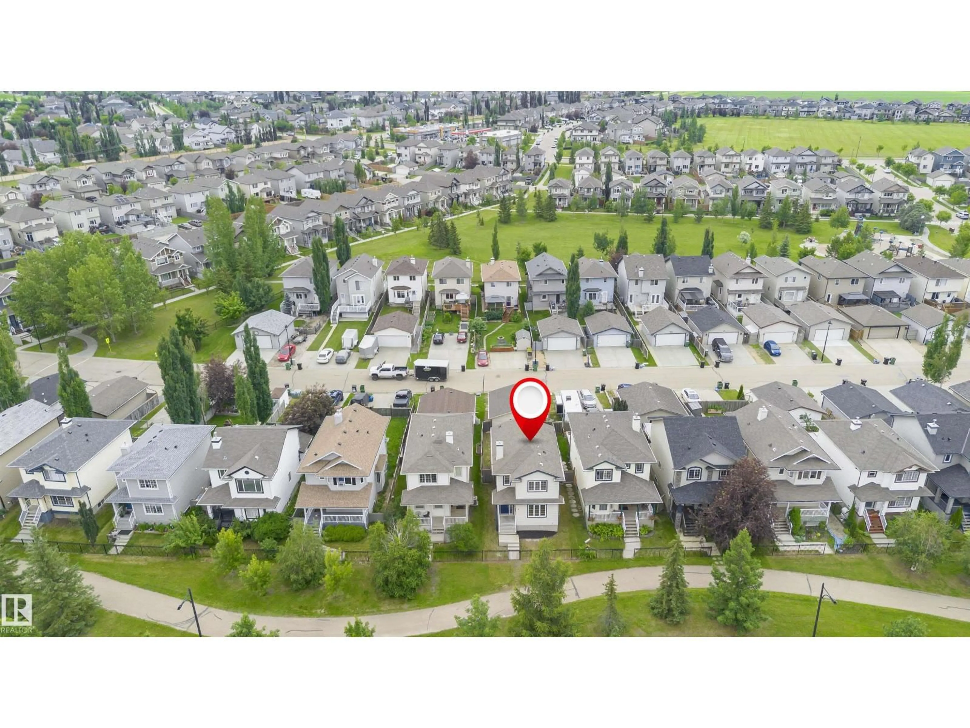 A pic from outside/outdoor area/front of a property/back of a property/a pic from drone, unknown for PM - 37 SUNTREE, Leduc Alberta T9E8R7