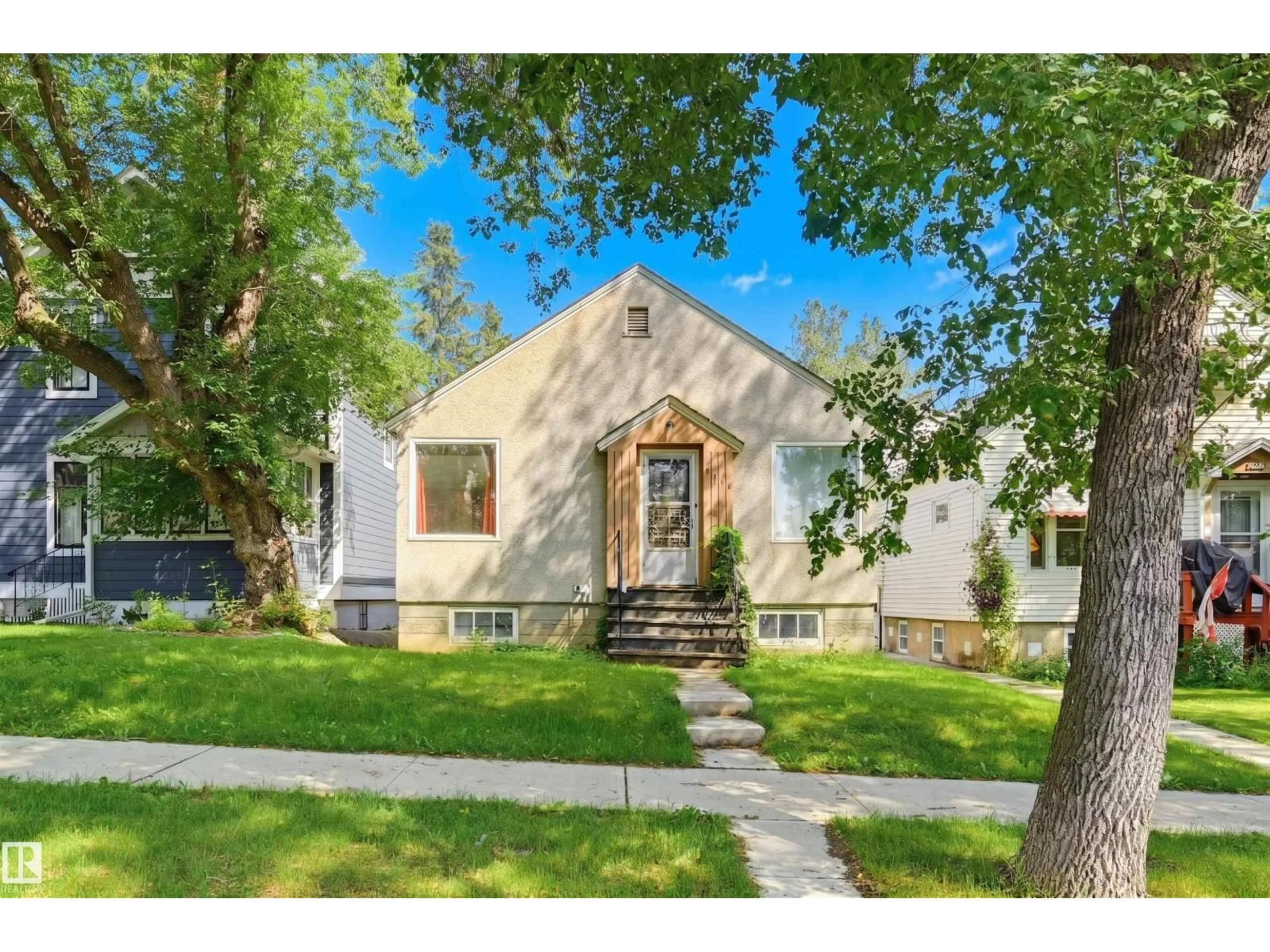 Home with brick exterior material, street for 9728 89 AV, Edmonton Alberta T6E2S2