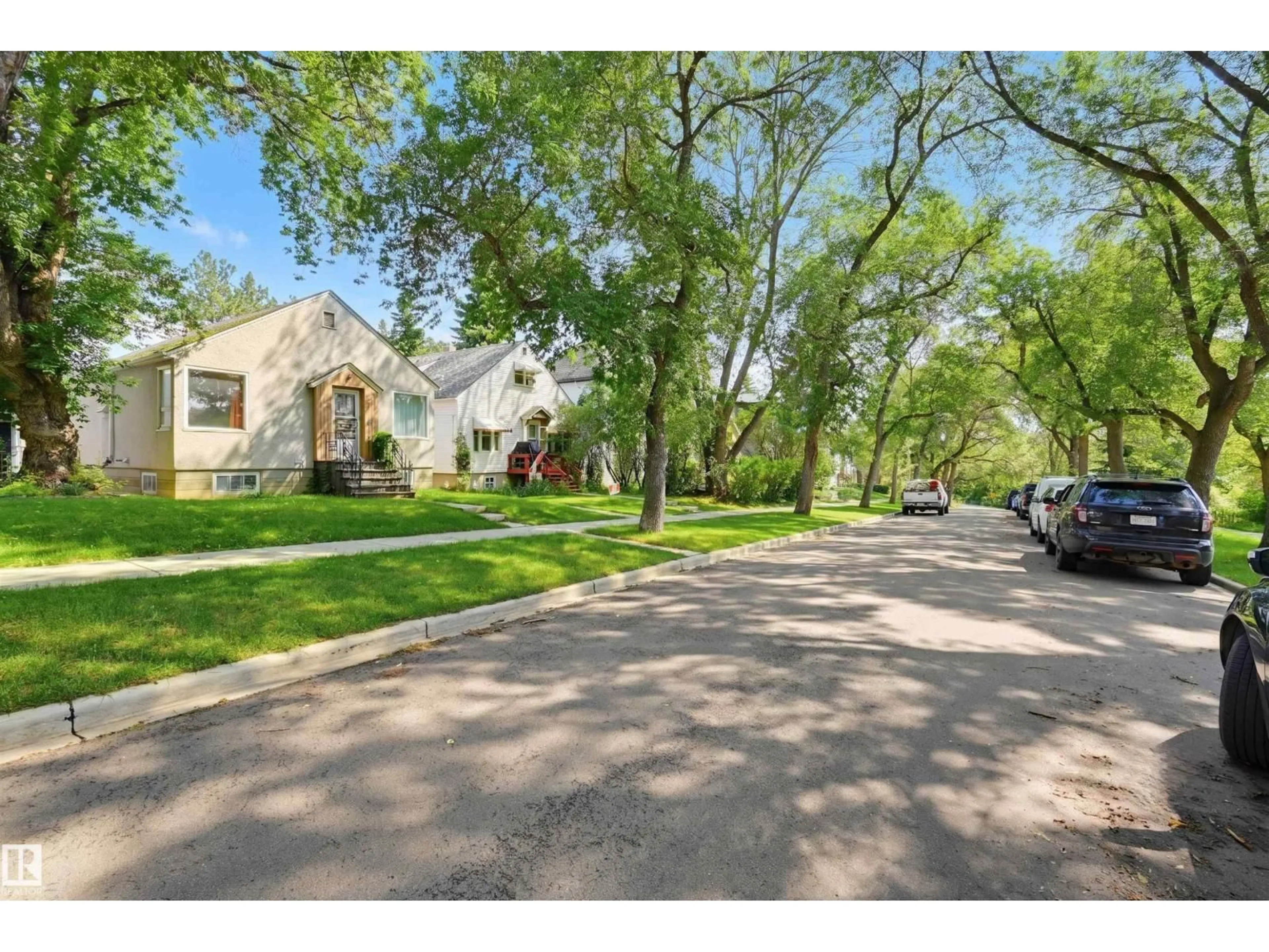 A pic from outside/outdoor area/front of a property/back of a property/a pic from drone, street for 9728 89 AV, Edmonton Alberta T6E2S2