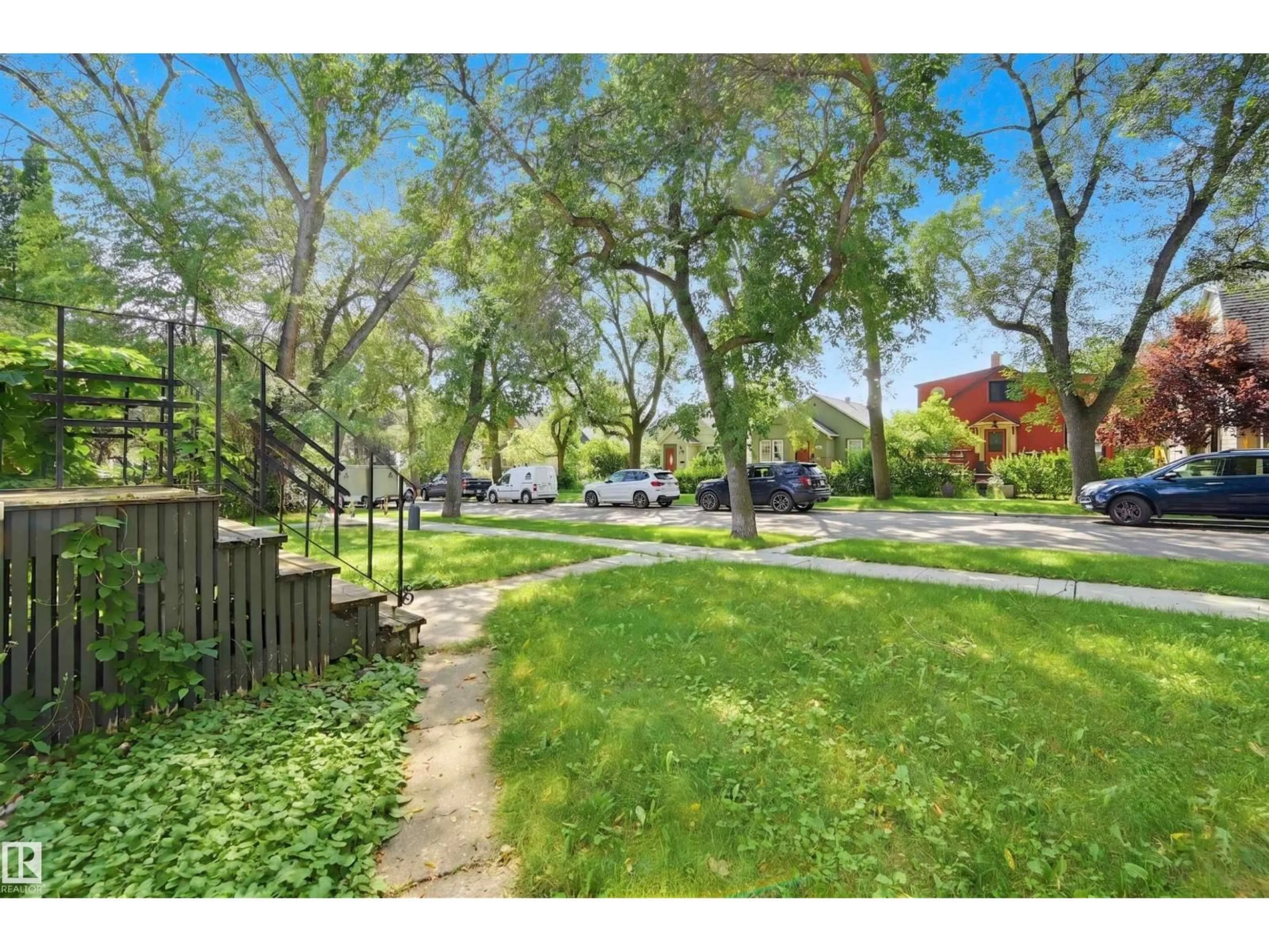 A pic from outside/outdoor area/front of a property/back of a property/a pic from drone, street for 9728 89 AV, Edmonton Alberta T6E2S2
