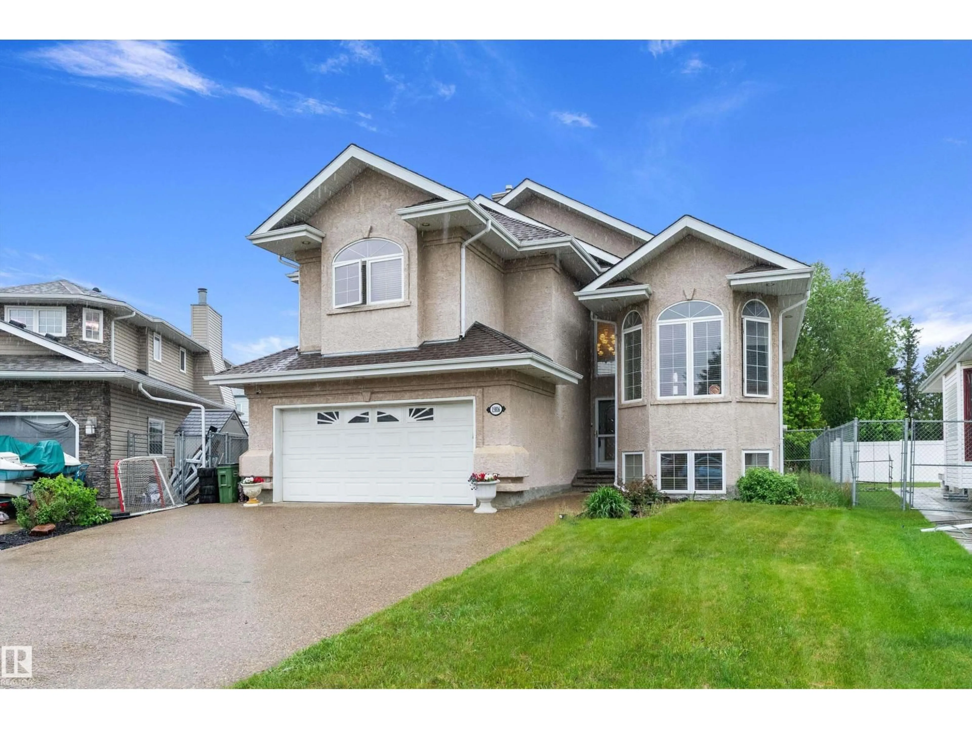 Home with vinyl exterior material, street for NW - 15816 64 ST, Edmonton Alberta T5Y2P1