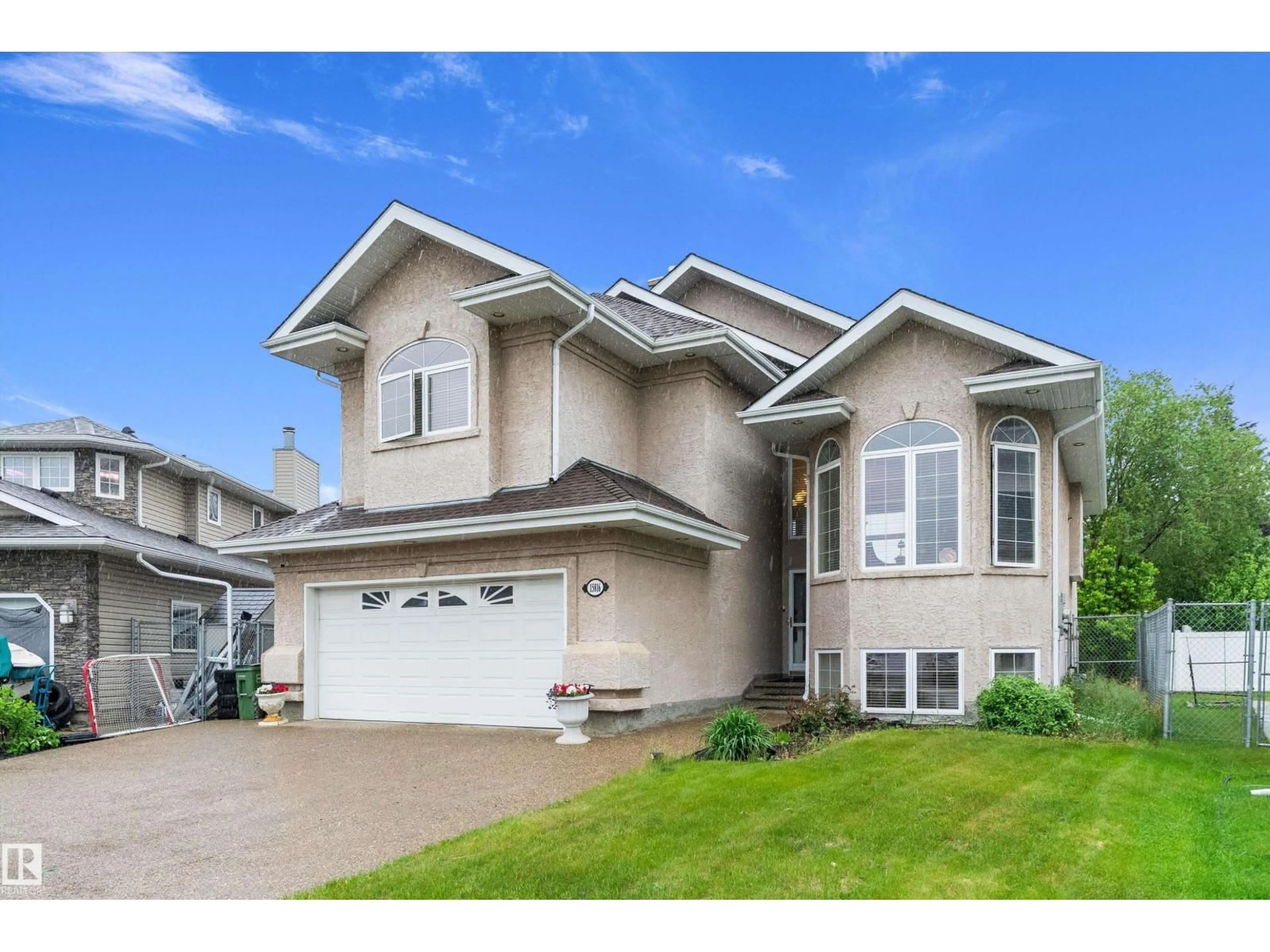 Home with vinyl exterior material, street for NW - 15816 64 ST, Edmonton Alberta T5Y2P1
