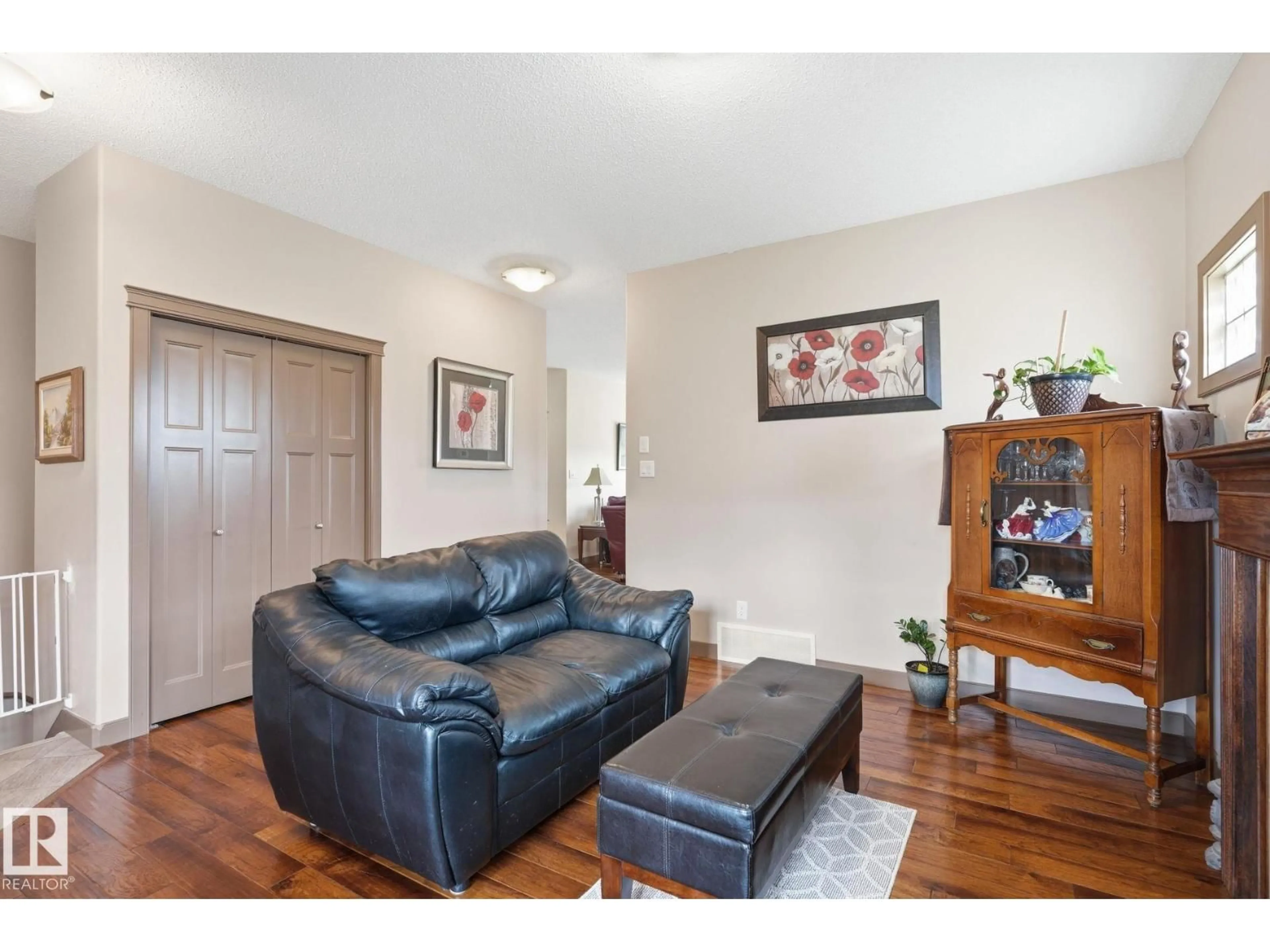 Living room with furniture, wood/laminate floor for #10 - 340 SPRUCE RIDGE RD, Spruce Grove Alberta T7X0J4