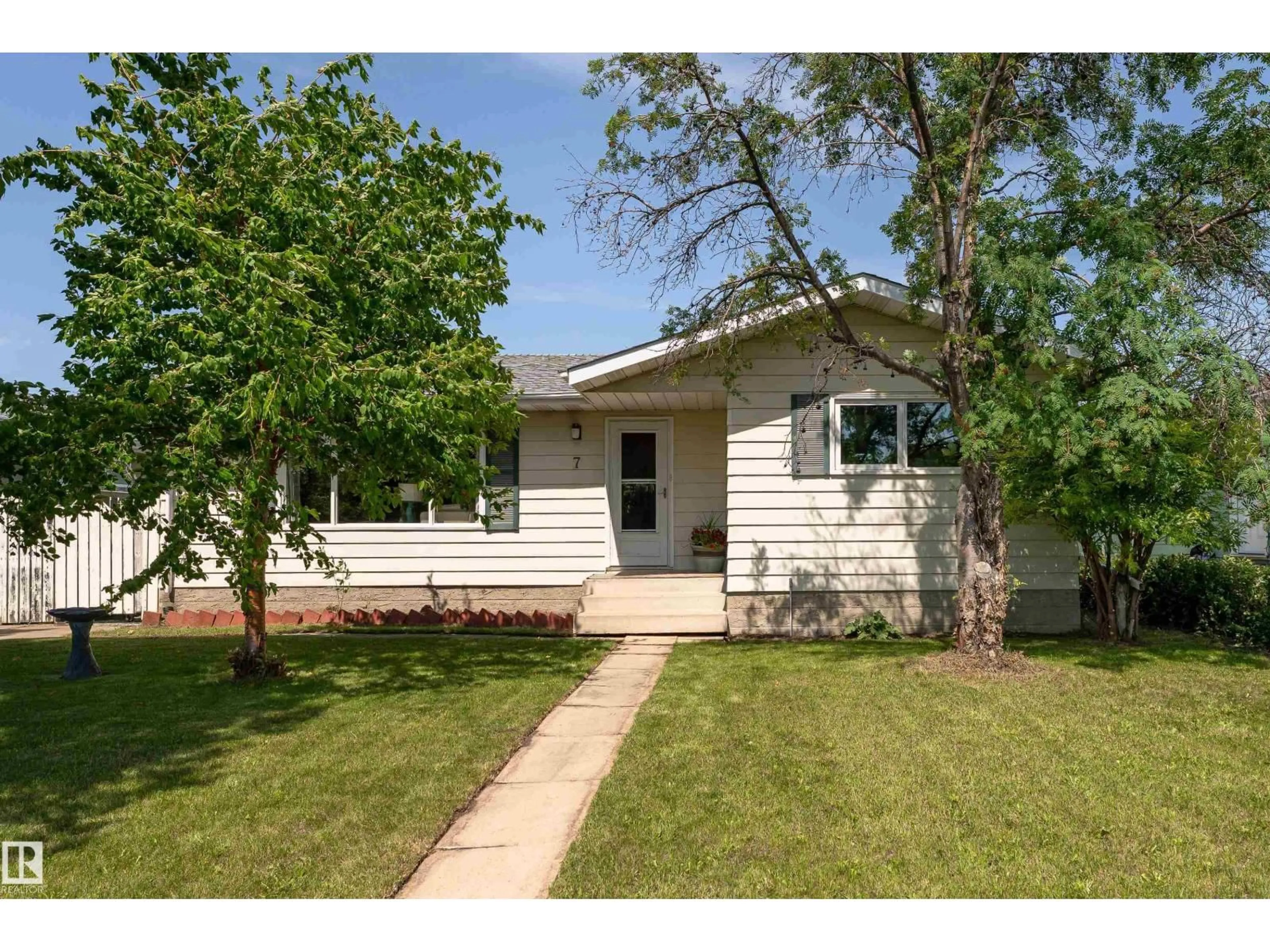 Home with vinyl exterior material, street for 7 CAMELOT CR, Leduc Alberta T9E4L4