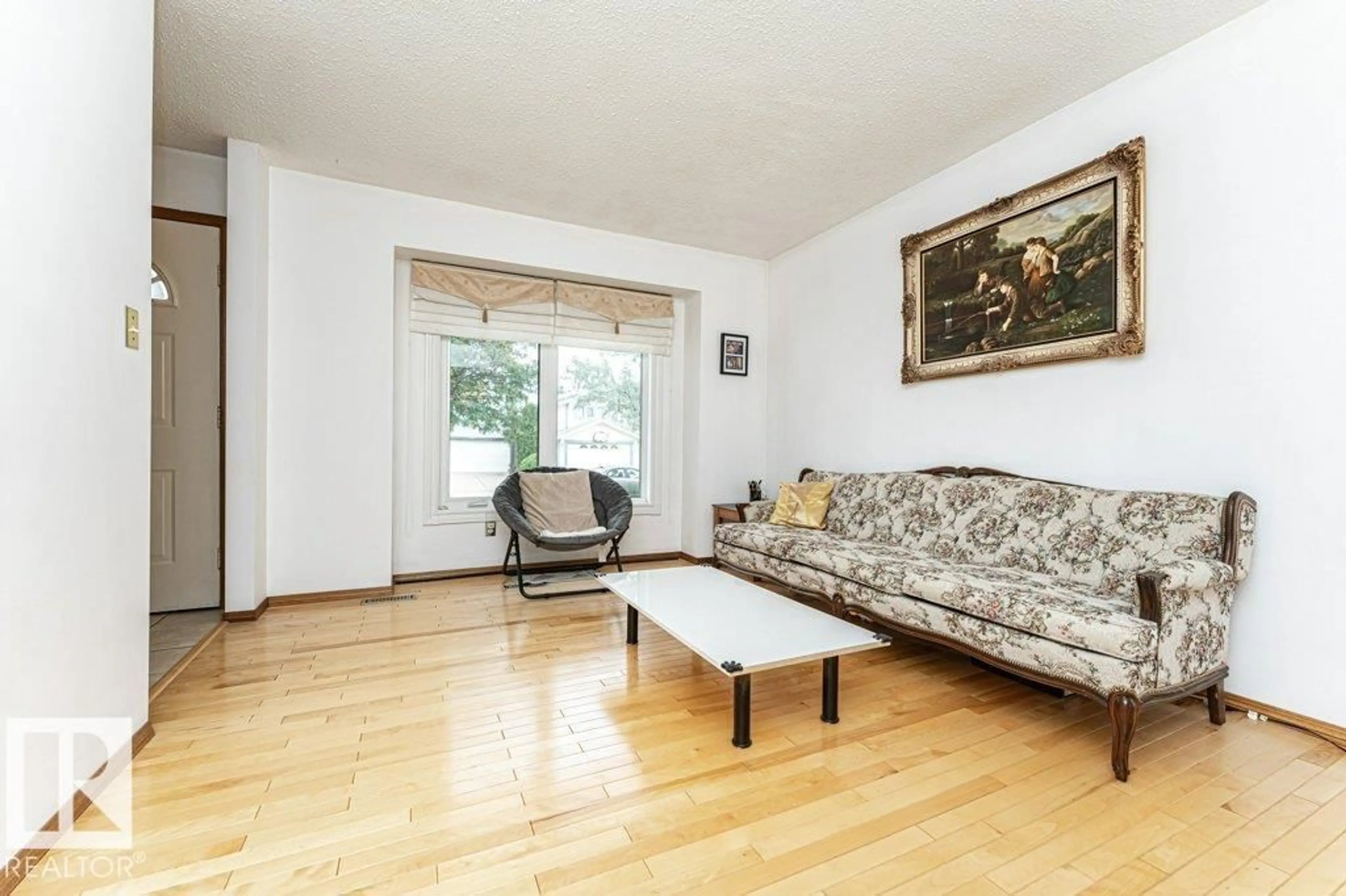 Living room with furniture, unknown for 3303 42A AV, Edmonton Alberta T6T1E6