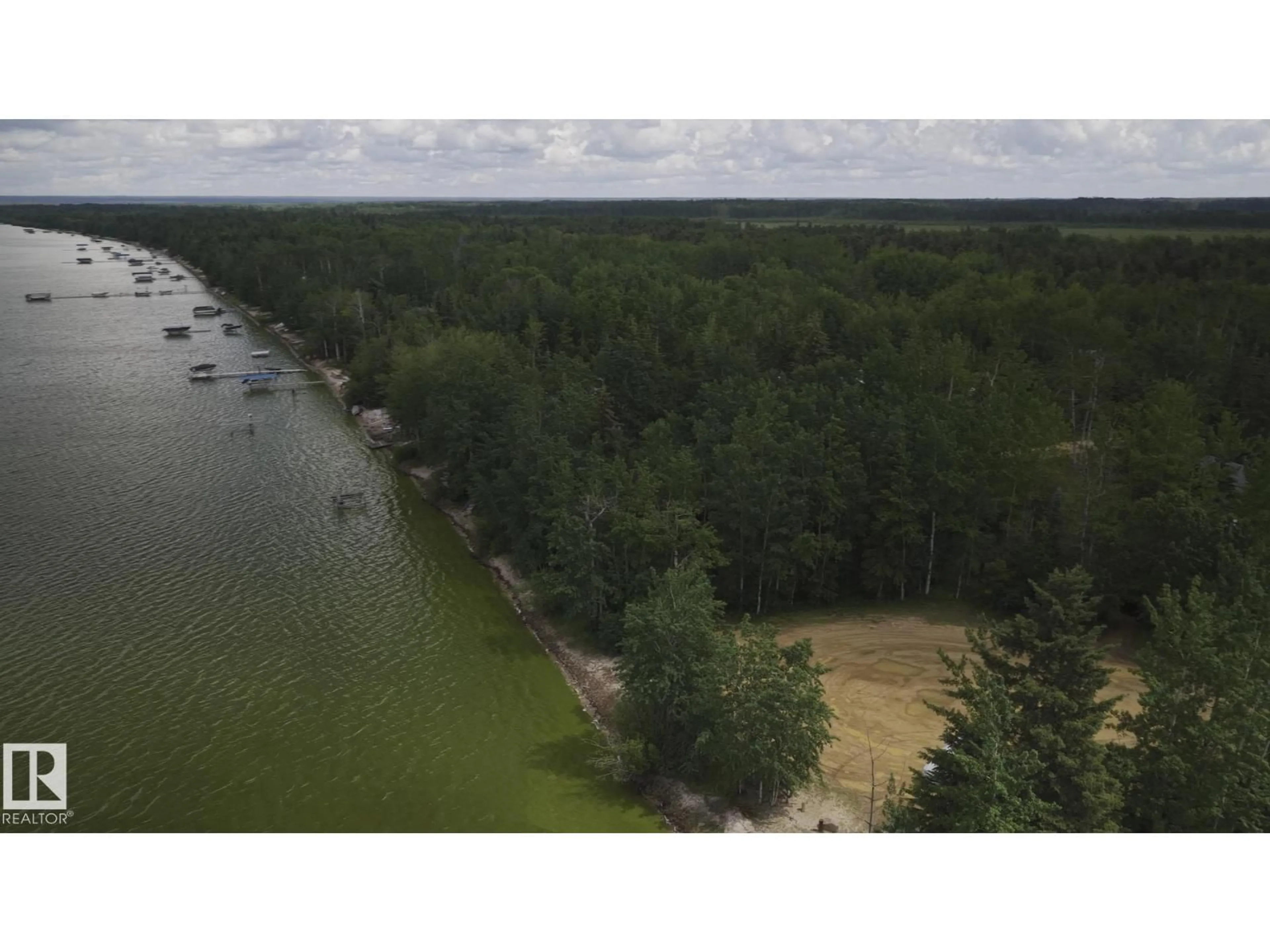 A pic from outside/outdoor area/front of a property/back of a property/a pic from drone, water/lake/river/ocean view for 1651 LAKEVIEW LN, Rural Opportunity M.D. Alberta T0G1K0