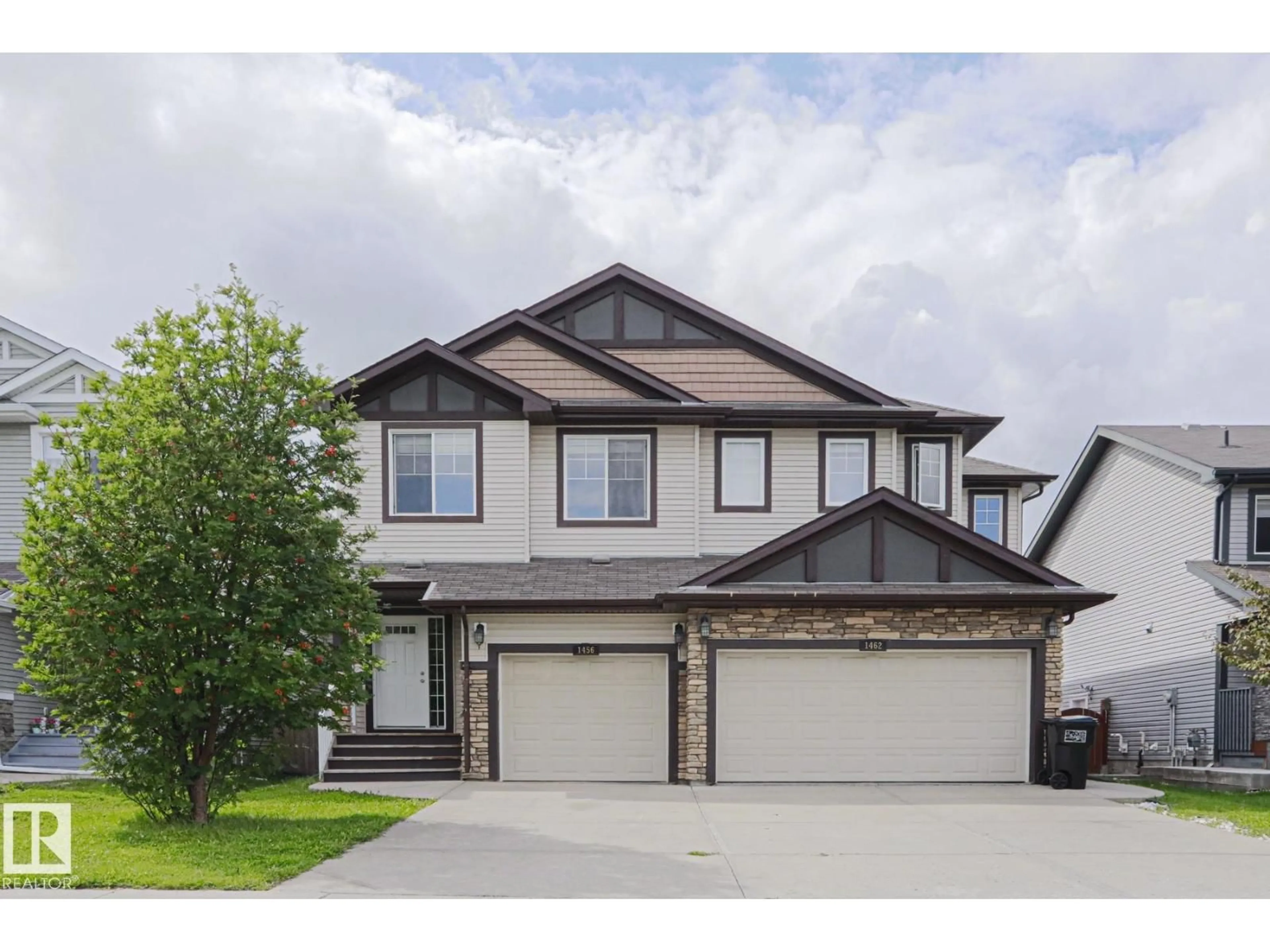 Home with vinyl exterior material, street for NW - 1456 33B ST, Edmonton Alberta T6T0X6