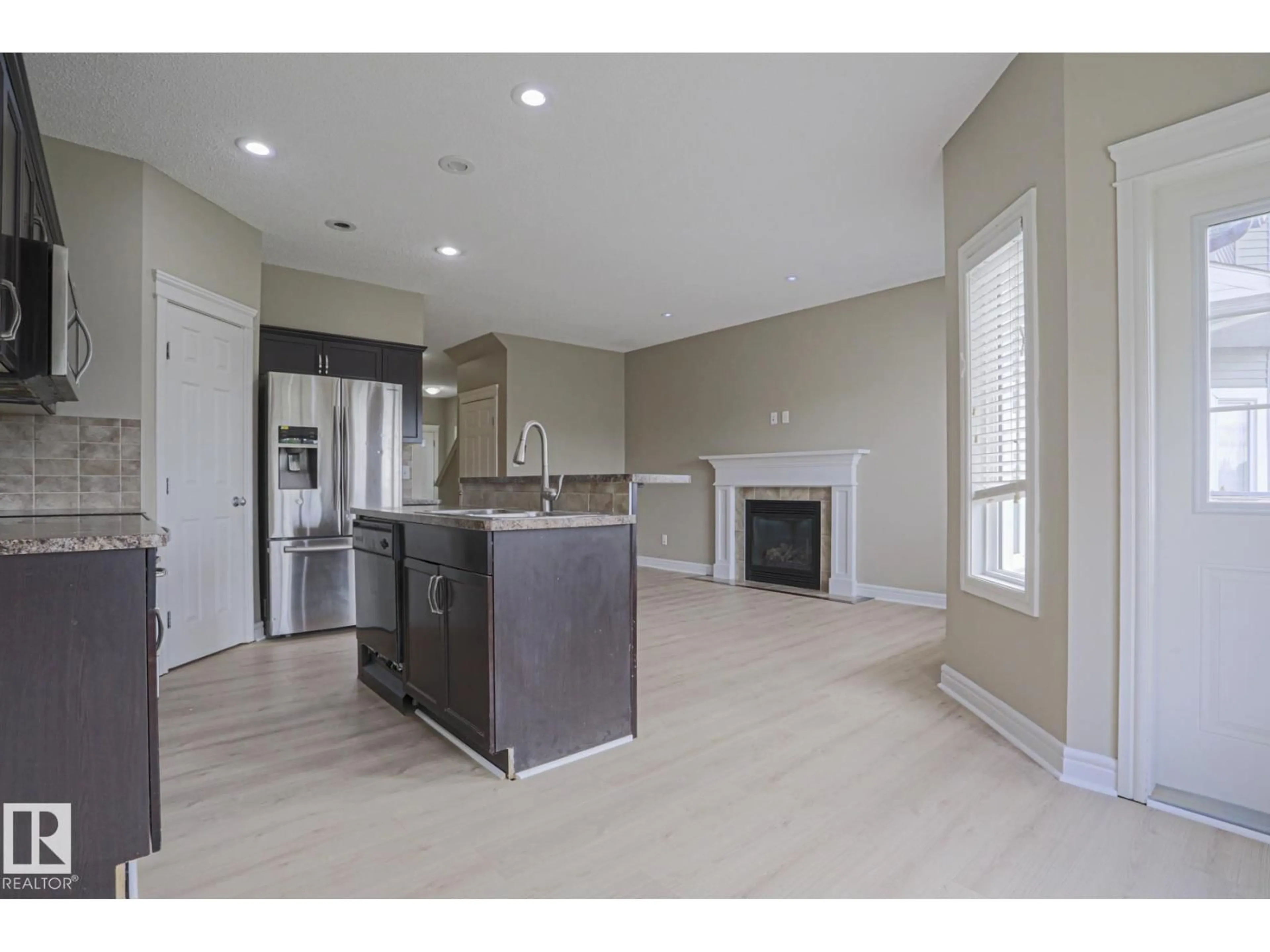 Open concept kitchen, ceramic/tile floor for NW - 1456 33B ST, Edmonton Alberta T6T0X6
