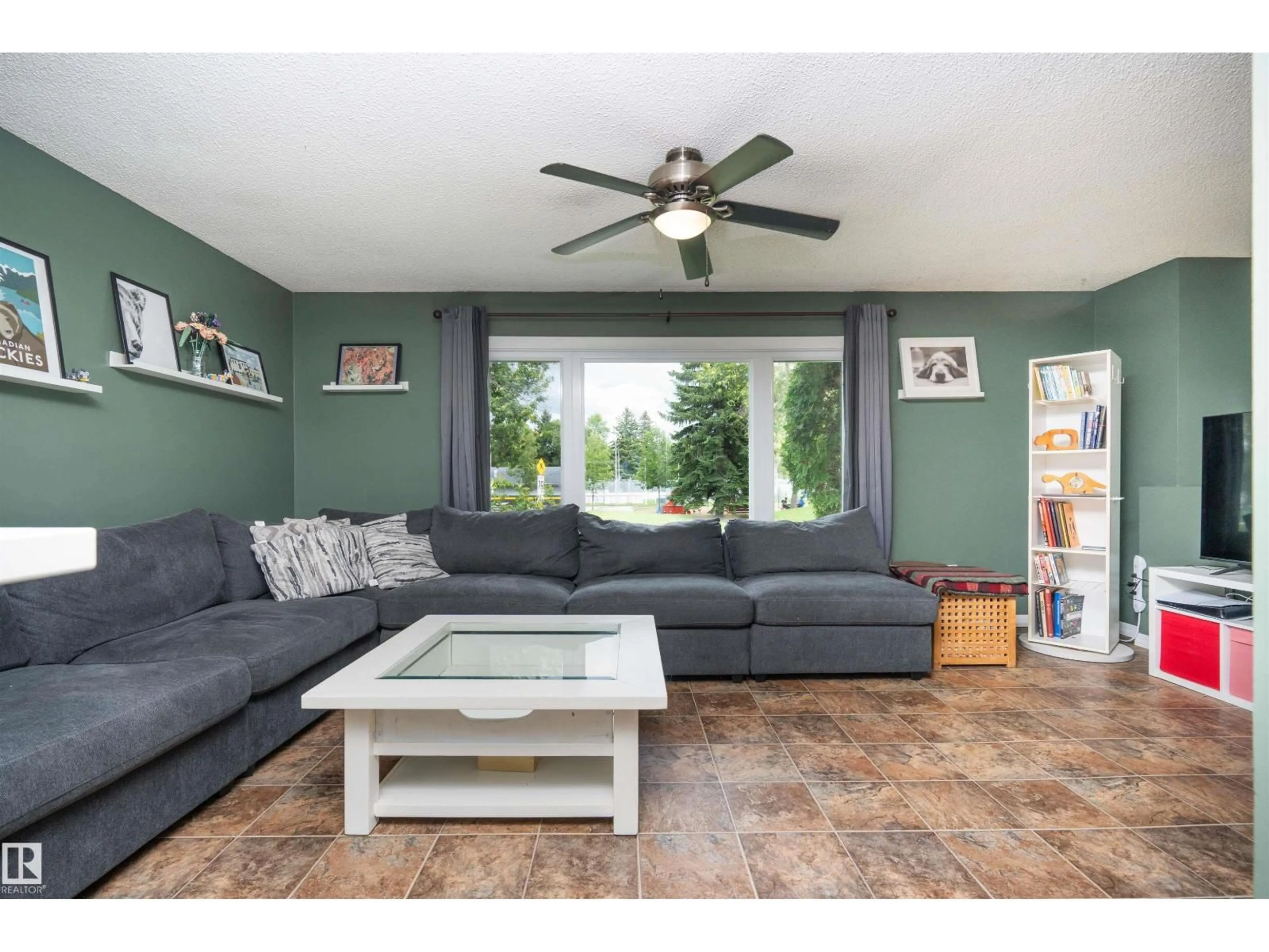 Living room with furniture, unknown for 12022 43 ST, Edmonton Alberta T5W2P8