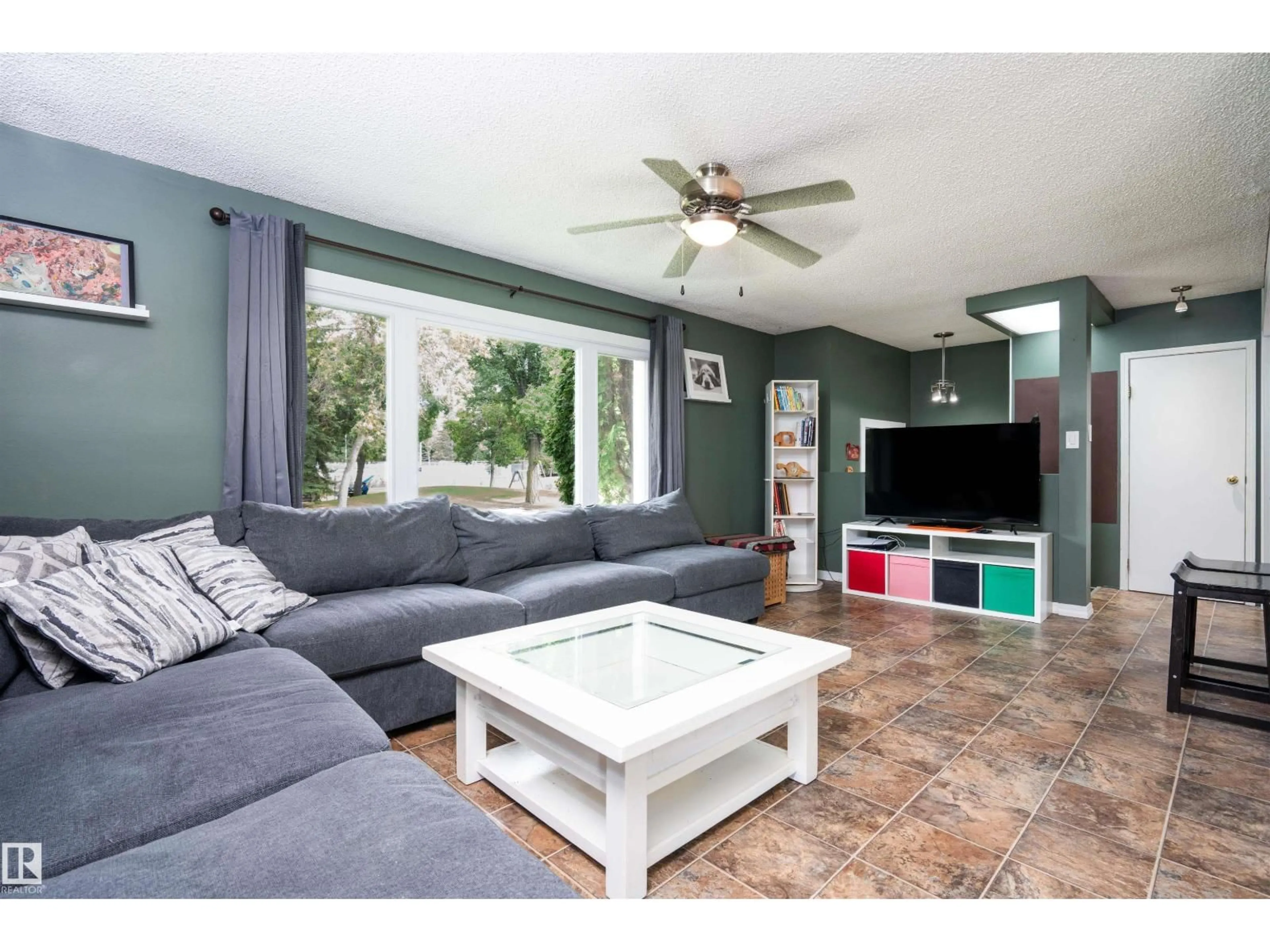 Living room with furniture, unknown for 12022 43 ST, Edmonton Alberta T5W2P8