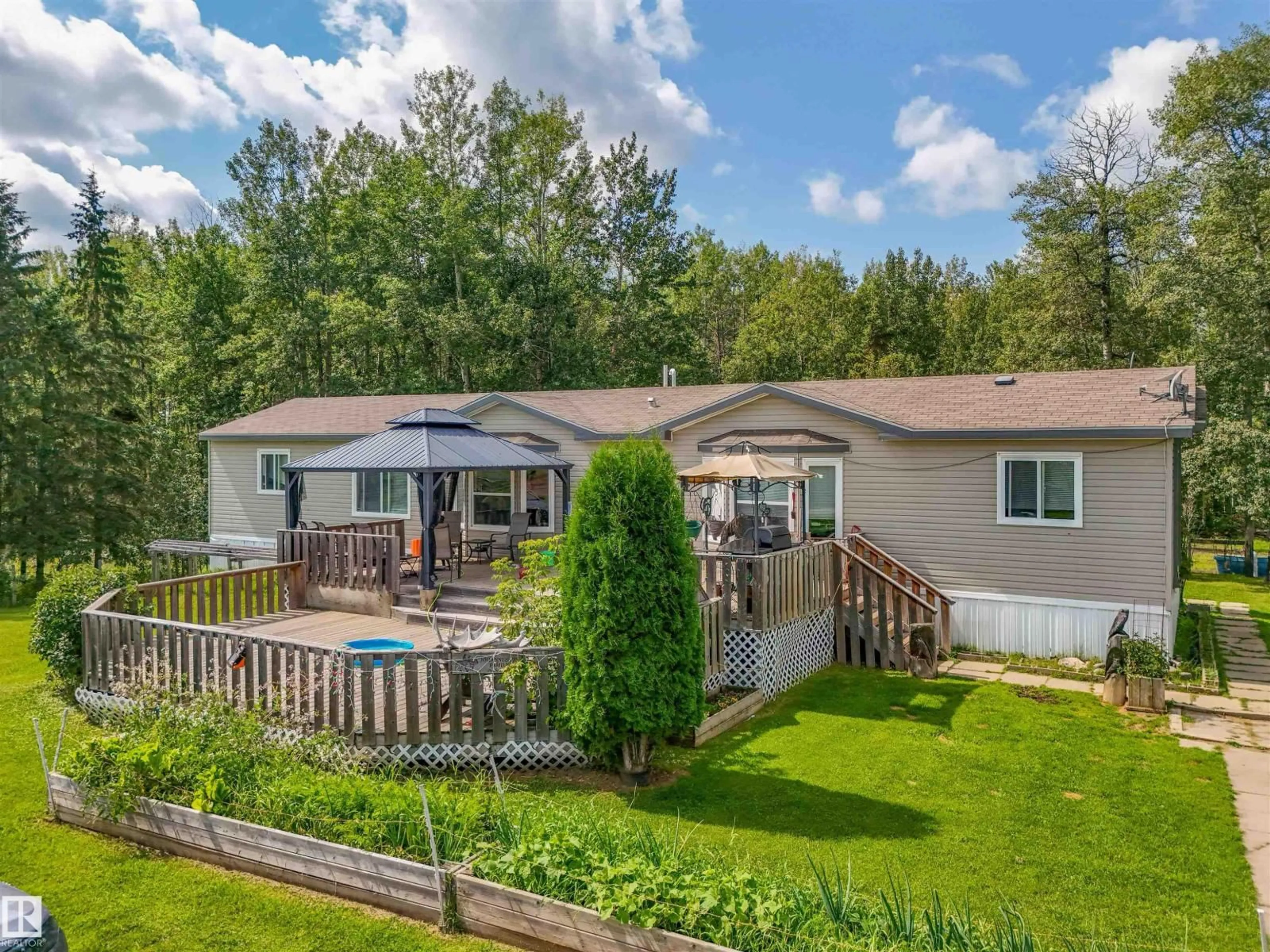 A pic from outside/outdoor area/front of a property/back of a property/a pic from drone, water/lake/river/ocean view for 7113 TWP ROAD 520, Rural Parkland County Alberta T0E2H0