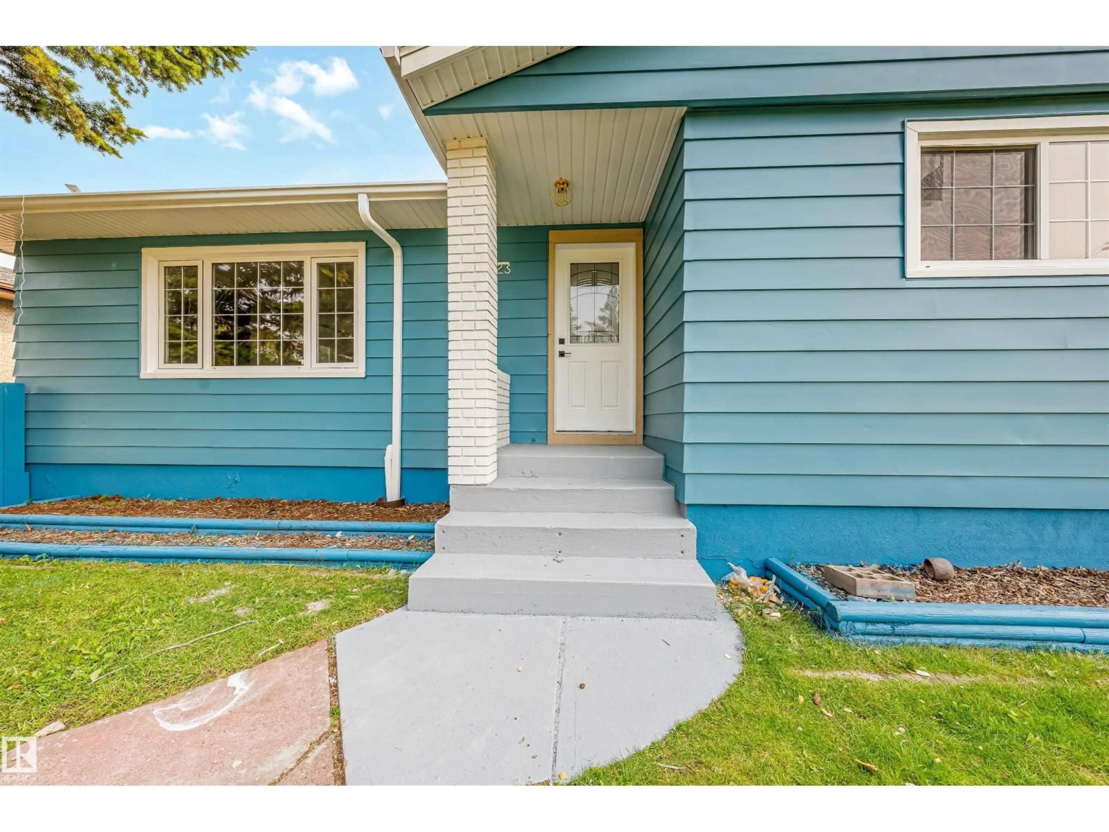 Home with vinyl exterior material, street for 12023 137 AV, Edmonton Alberta T5E1Z7