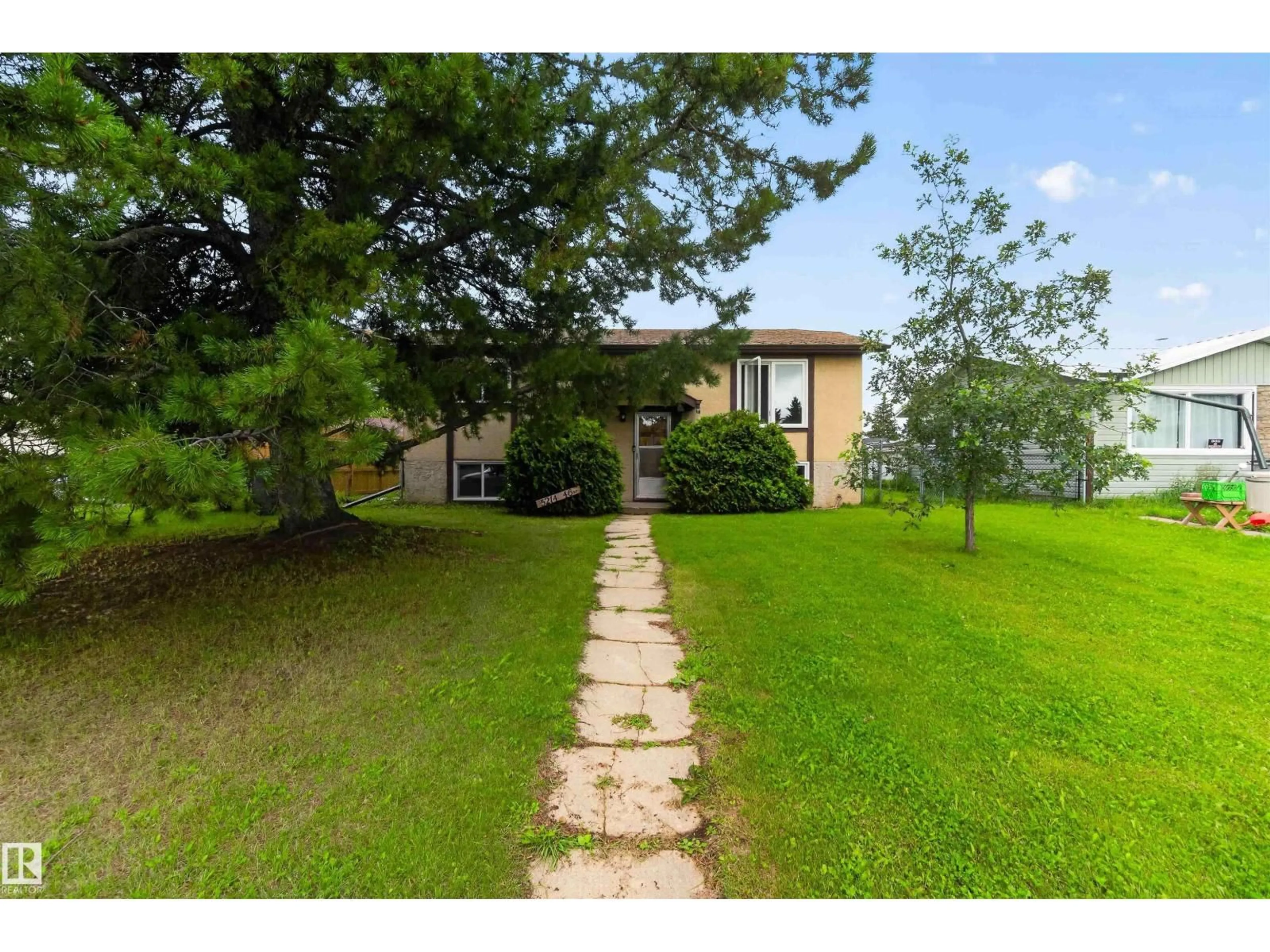 A pic from outside/outdoor area/front of a property/back of a property/a pic from drone, water/lake/river/ocean view for 5214 46 ST, Bon Accord Alberta T0A1K0
