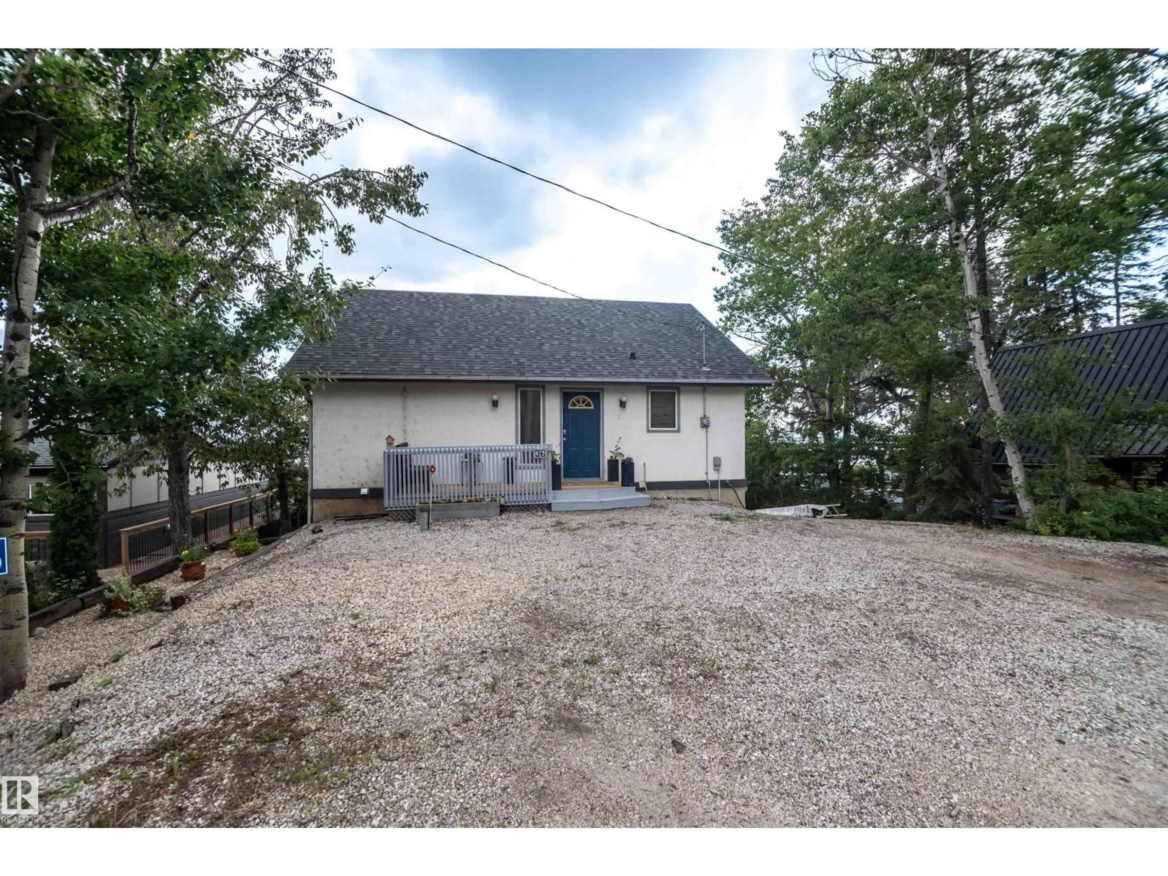 A pic from outside/outdoor area/front of a property/back of a property/a pic from drone, unknown for 55022 - 36 STE. ANNE TR, Rural Lac Ste. Anne County Alberta T0E1A0