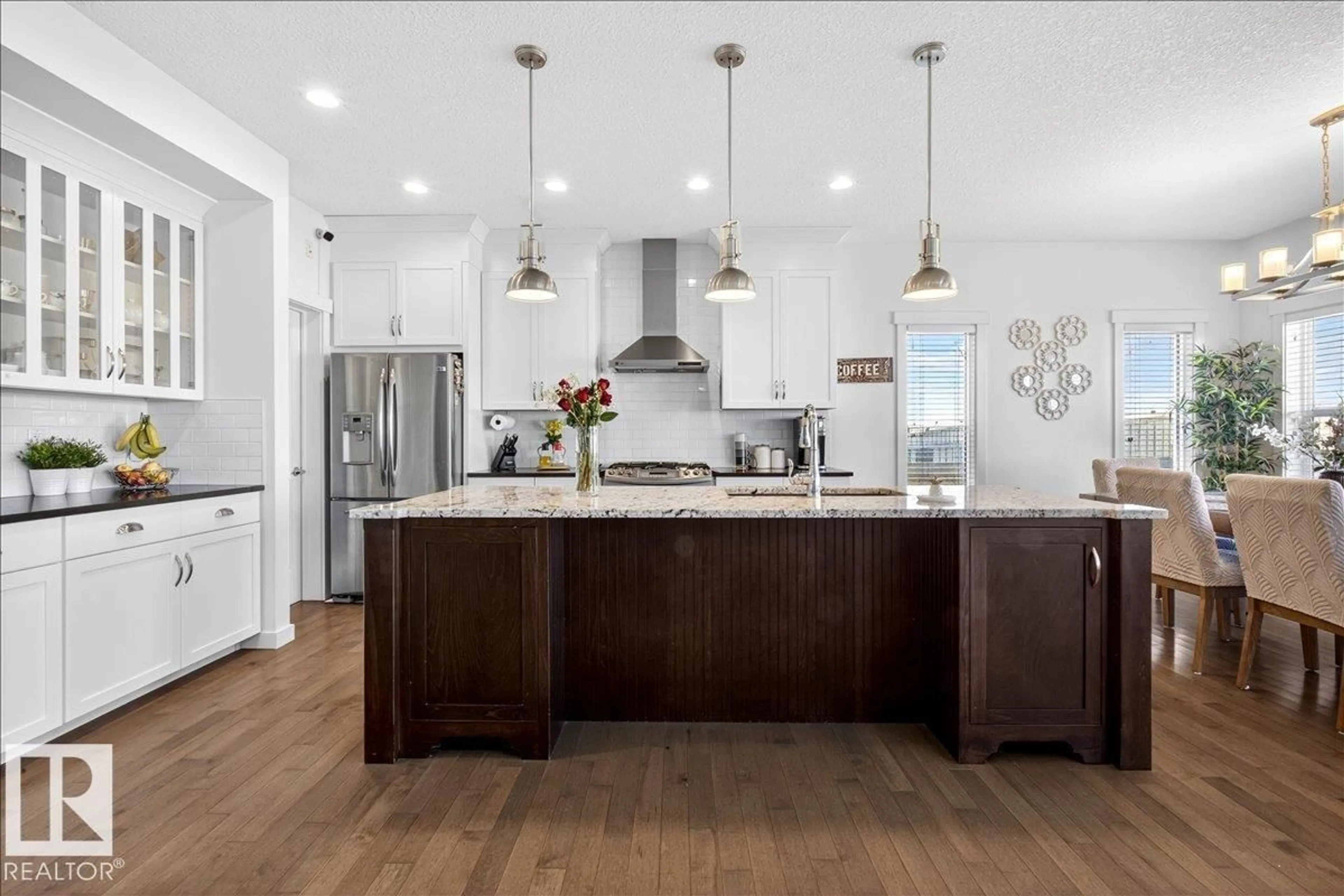 Open concept kitchen, wood/laminate floor for 3936 CLAXTON LO, Edmonton Alberta T6W1Y6