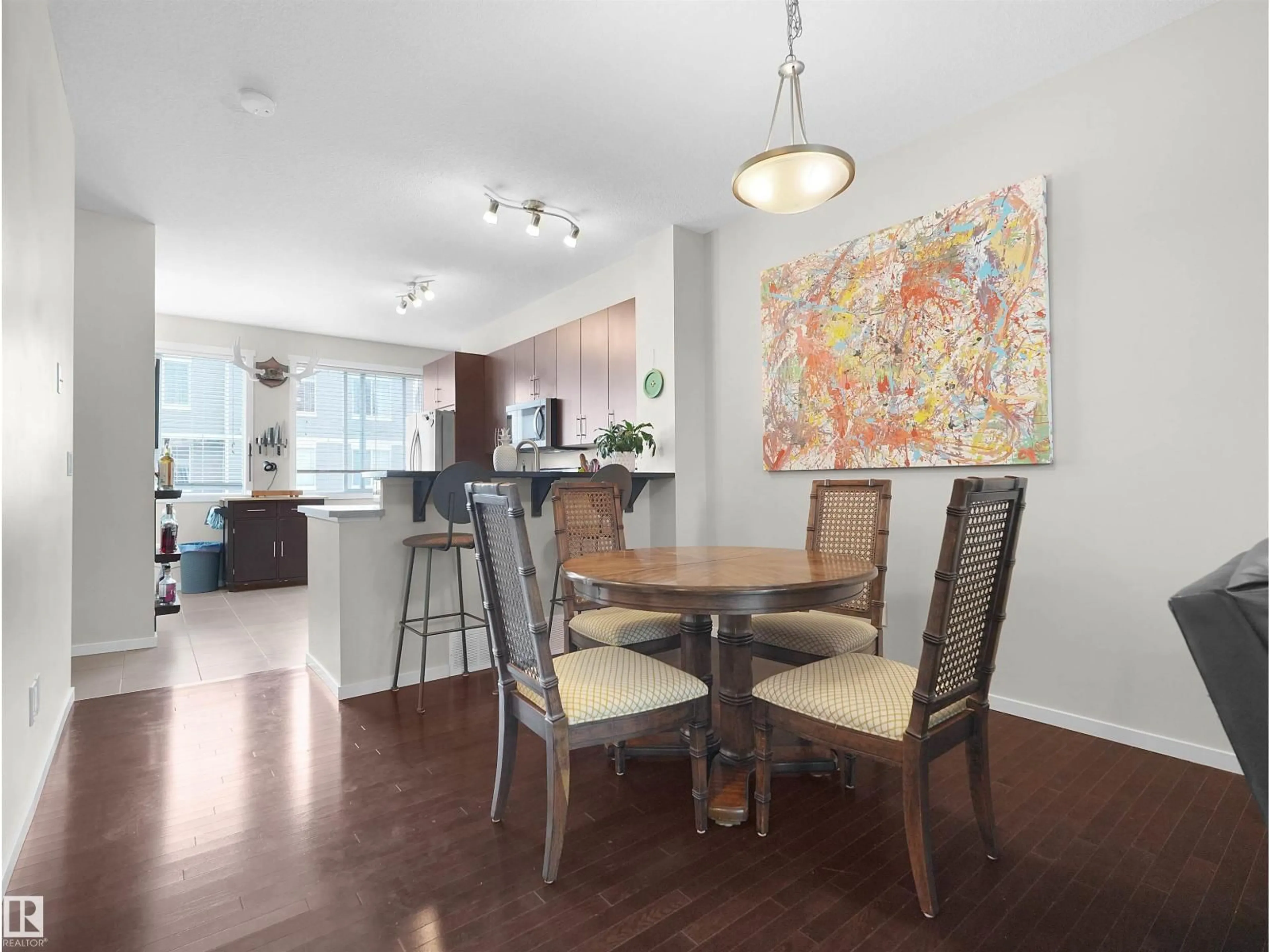 Dining room, wood/laminate floor for 603 - 89 WATT BV, Edmonton Alberta T6X0P3