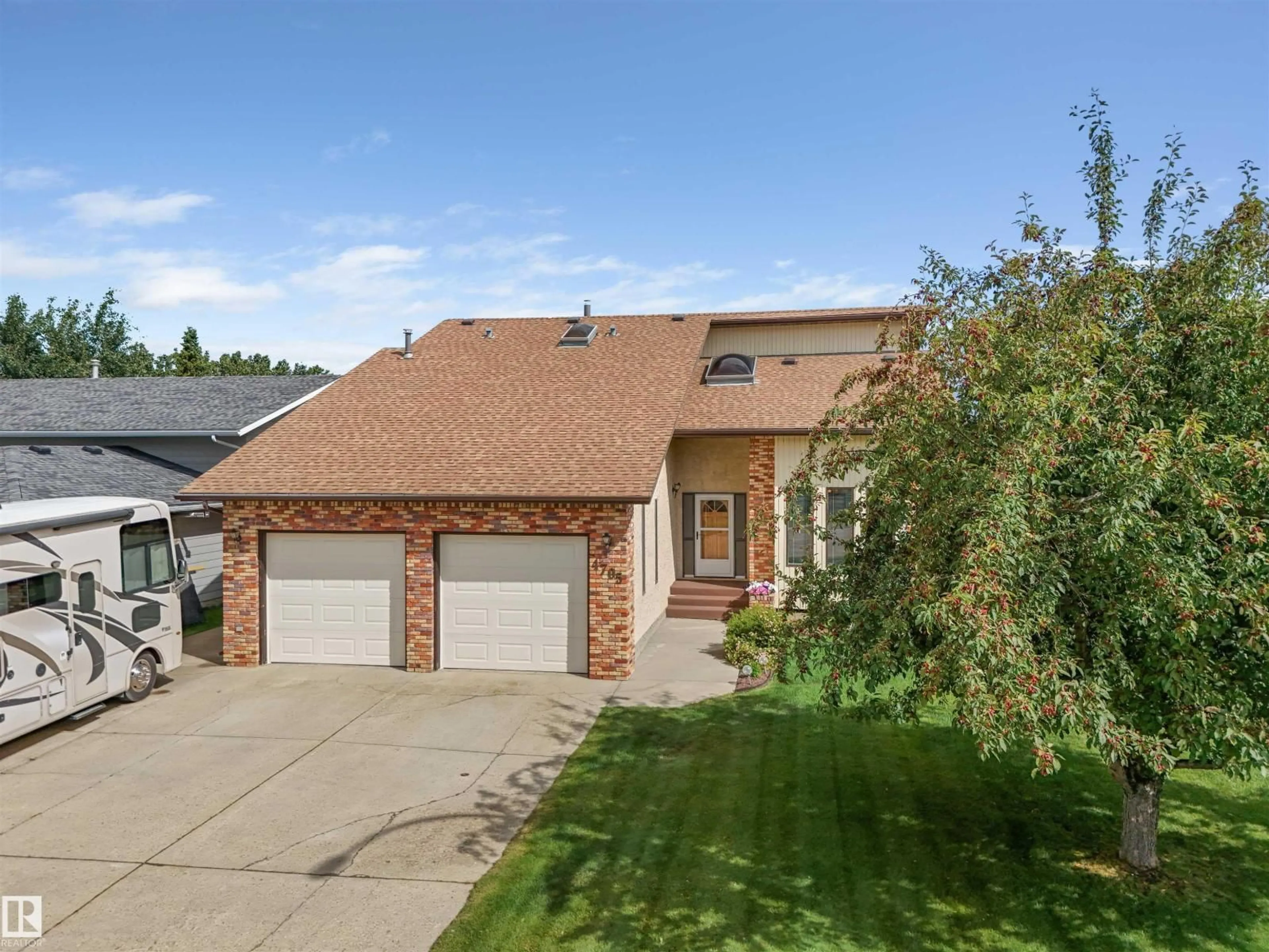 Home with brick exterior material, street for 4705 BECKETT RD, Drayton Valley Alberta T7A1E8