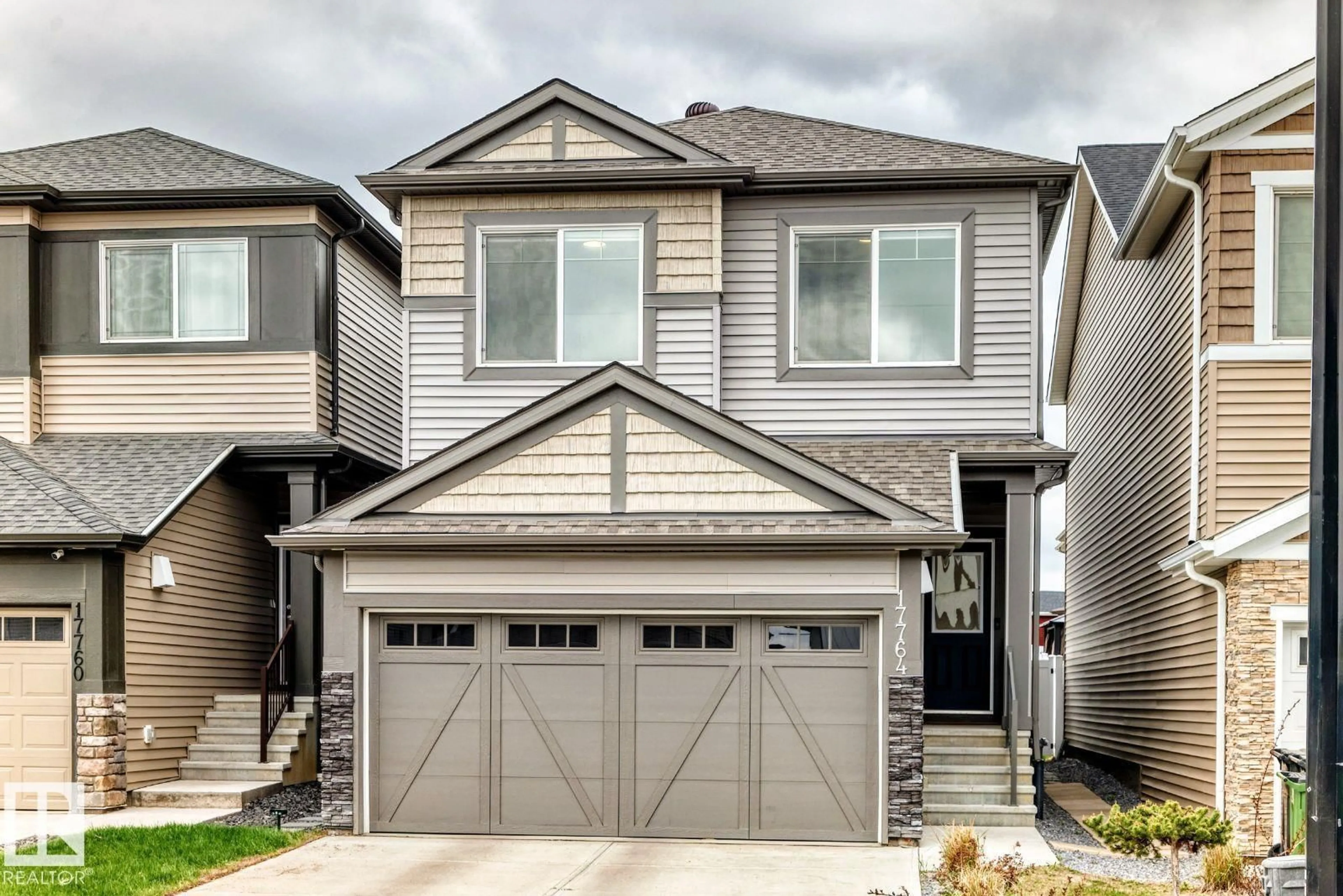 Home with vinyl exterior material, street for 17764 73 ST, Edmonton Alberta T5Z0V8