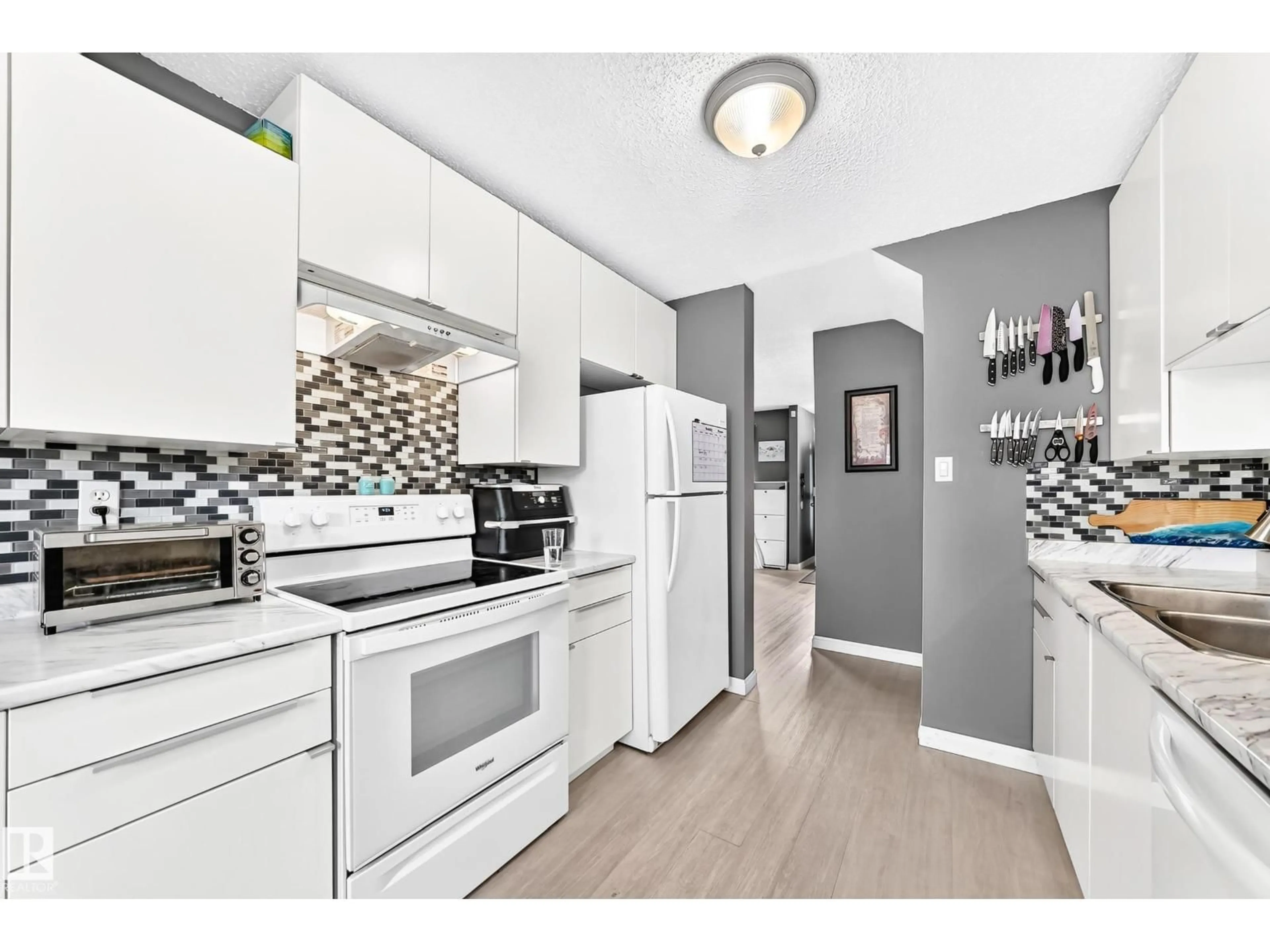 Open concept kitchen, unknown for #30 - 1651 46 ST, Edmonton Alberta T6L5H2