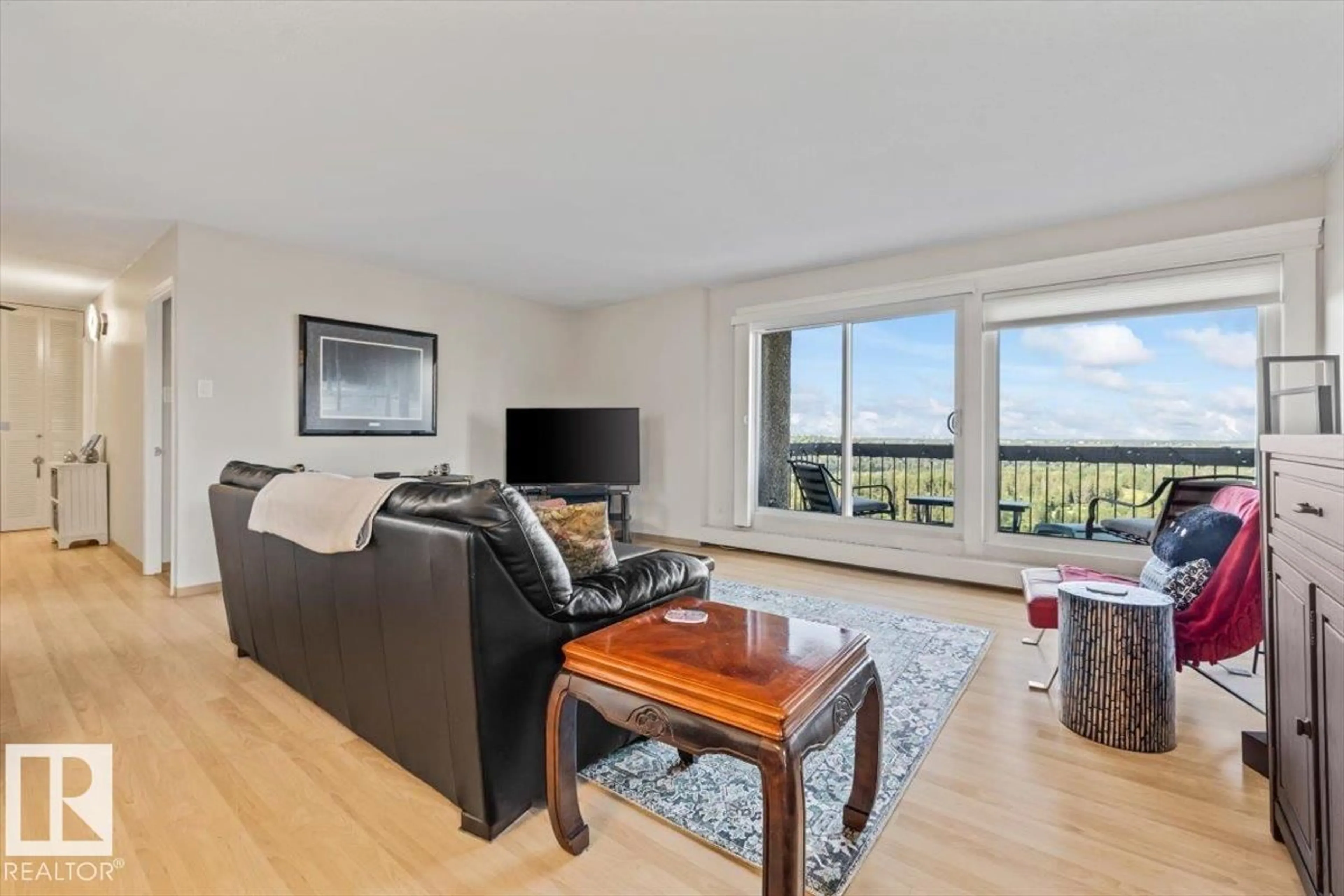 Living room with furniture, unknown for 701 - 9737 112 ST NW, Edmonton Alberta T5K1L3