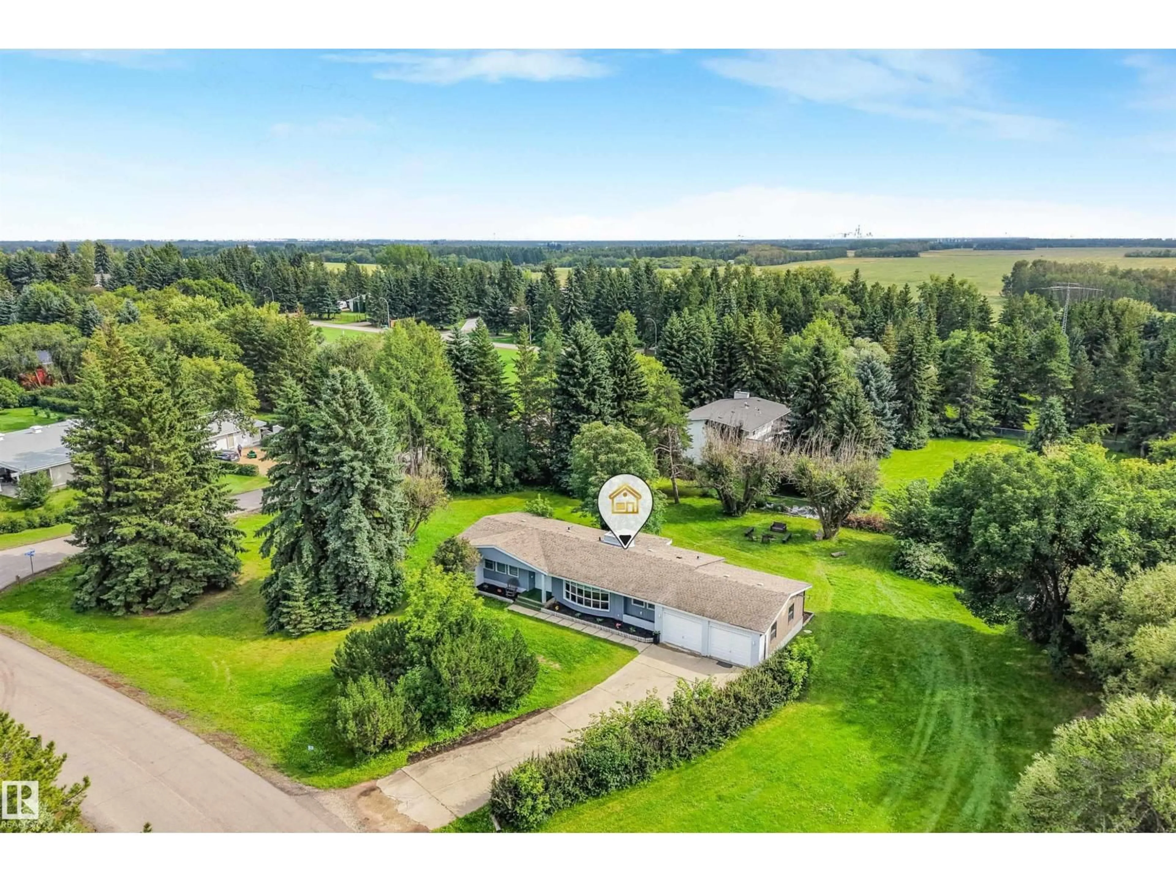 A pic from outside/outdoor area/front of a property/back of a property/a pic from drone, unknown for 52 25019 STURGEON RD, Rural Sturgeon County Alberta T8T0E1