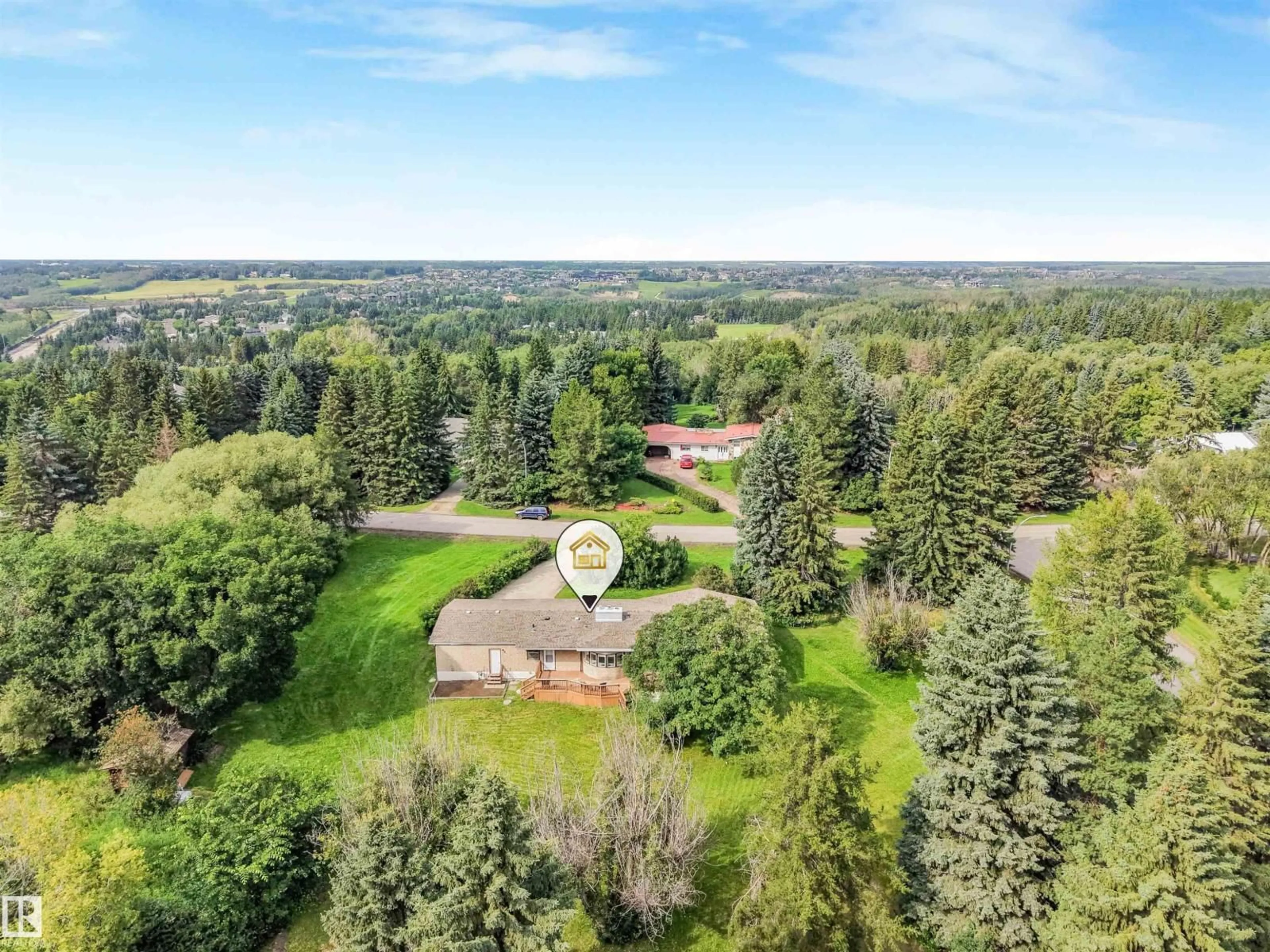 A pic from outside/outdoor area/front of a property/back of a property/a pic from drone, unknown for 52 25019 STURGEON RD, Rural Sturgeon County Alberta T8T0E1