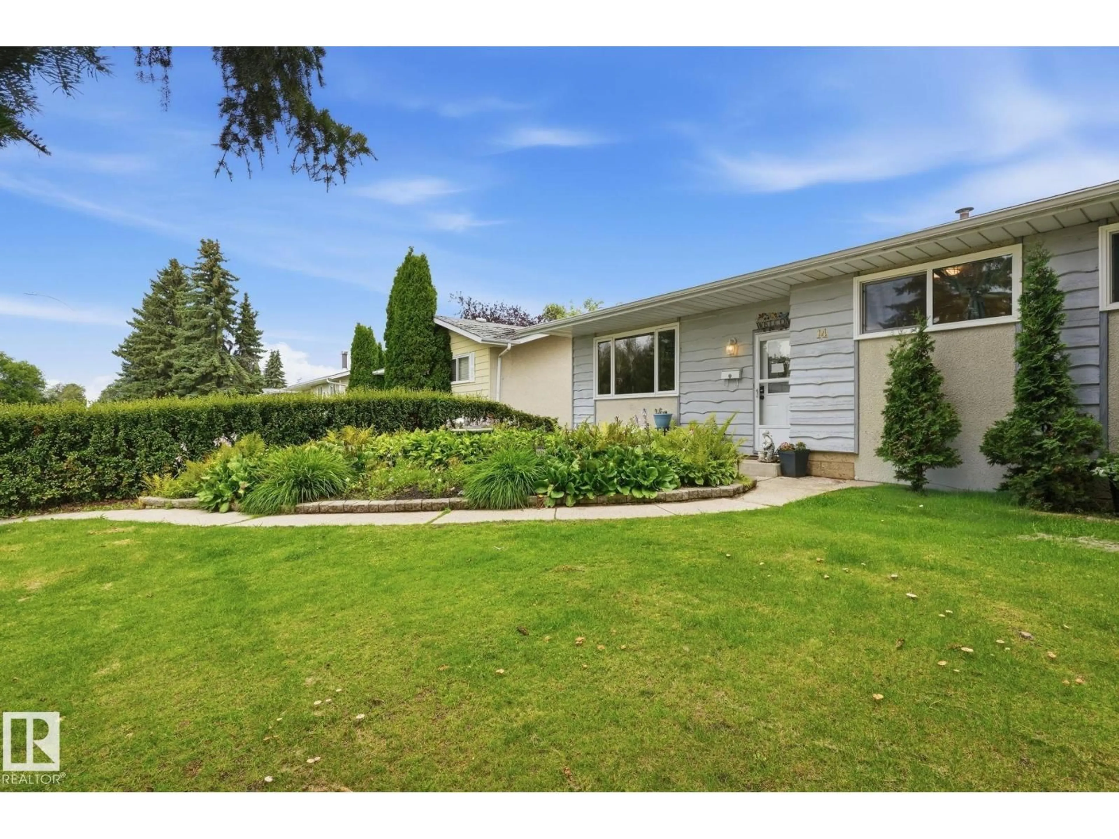 Home with vinyl exterior material, street for 14 BRAMPTON ST, Spruce Grove Alberta T7X1G1