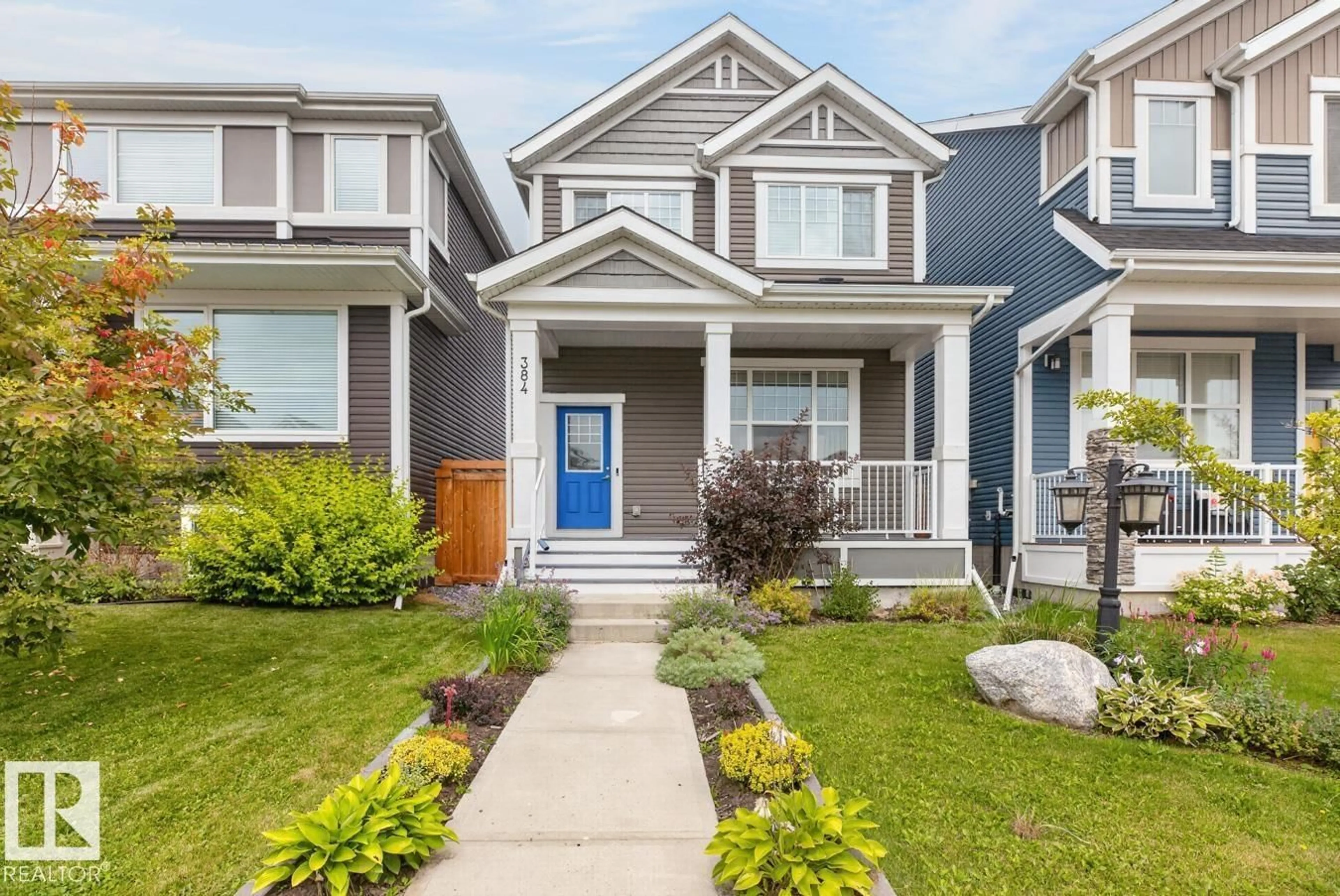 Home with vinyl exterior material, street for 384 STOUT LN, Leduc Alberta T9E1K4