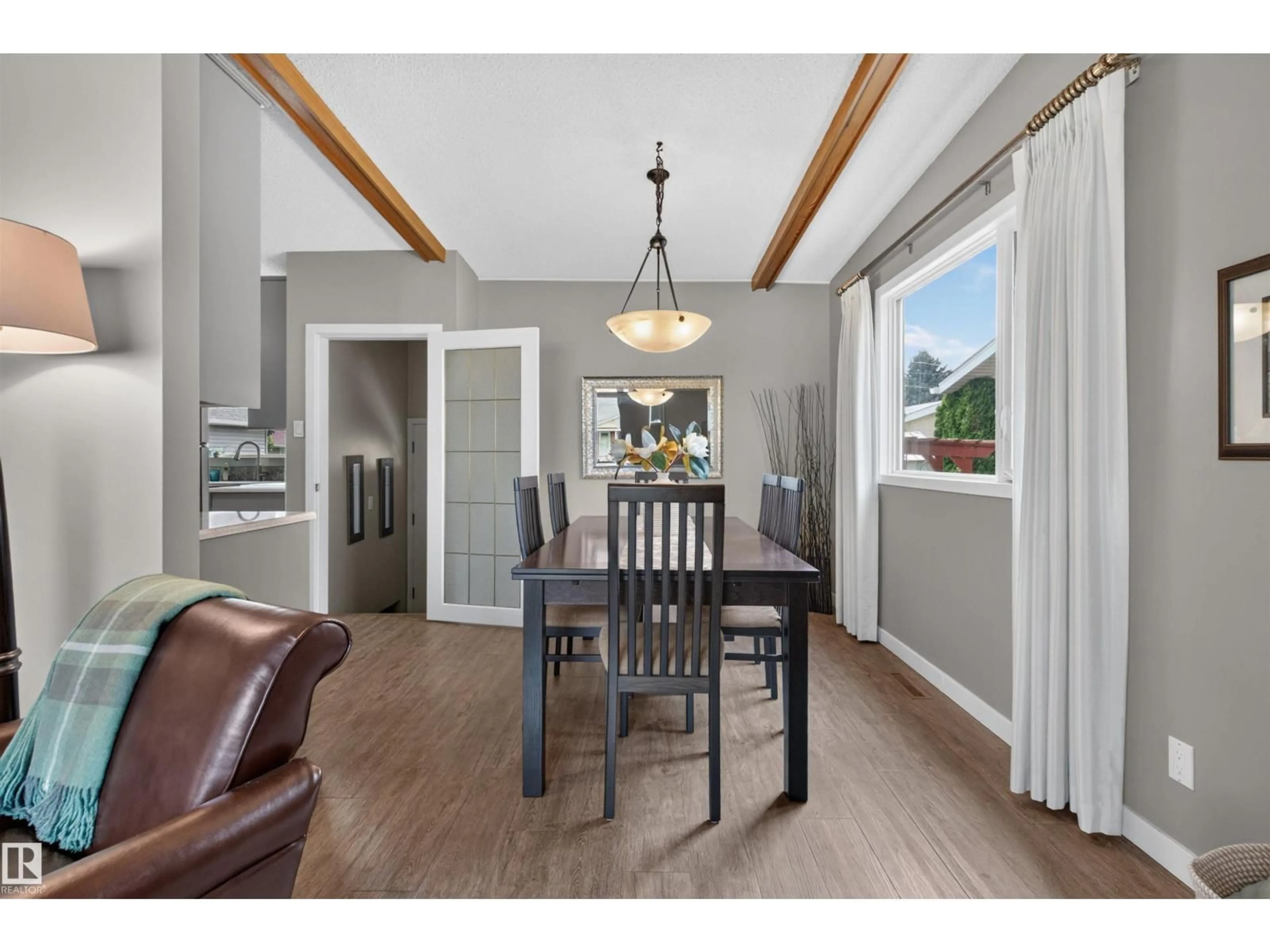 Dining room, wood/laminate floor for 6503 88 AV, Edmonton Alberta T6B0M1