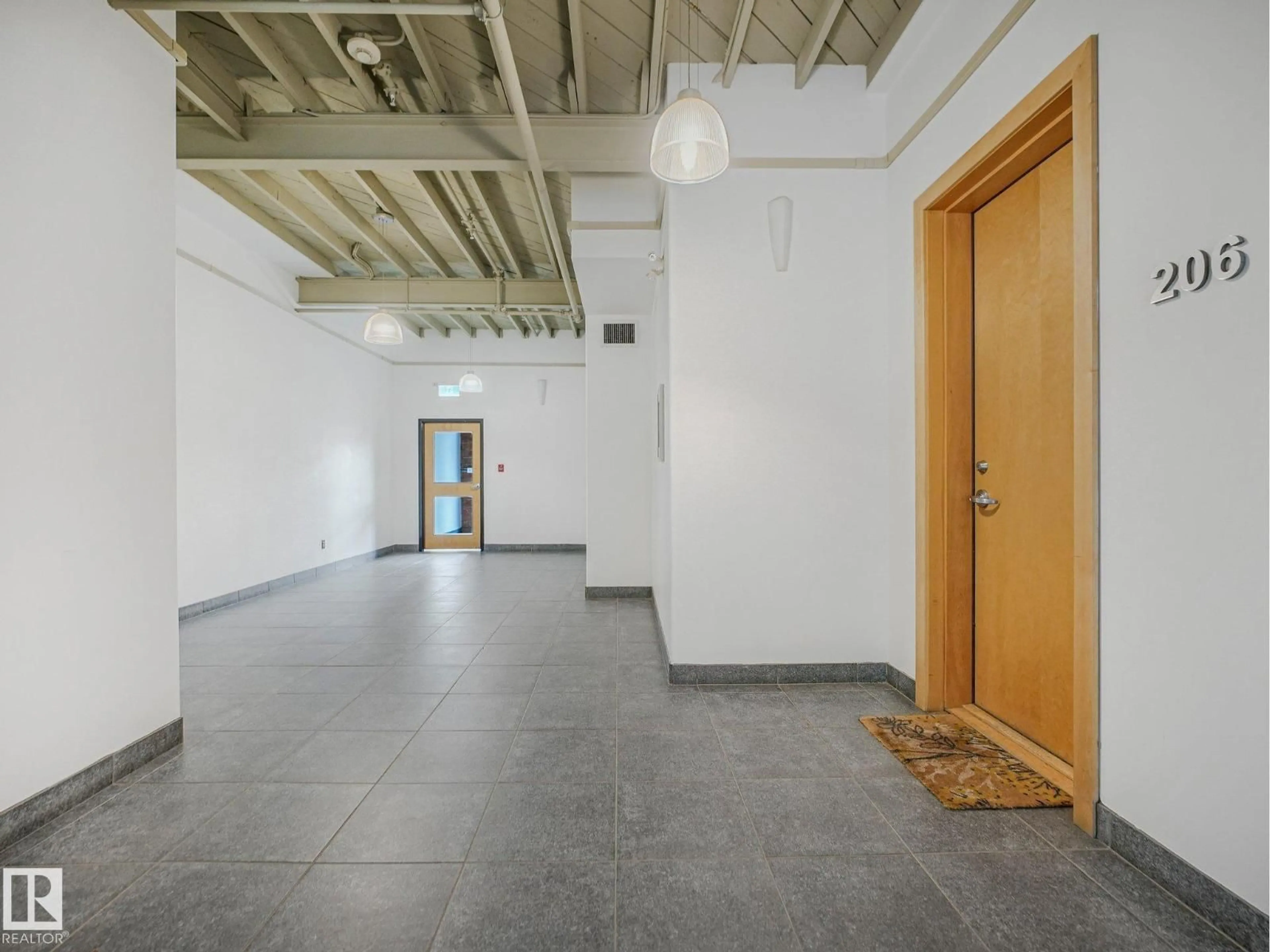 Indoor foyer for 206 - 10265 107 ST NW, Edmonton Alberta T5J5G2