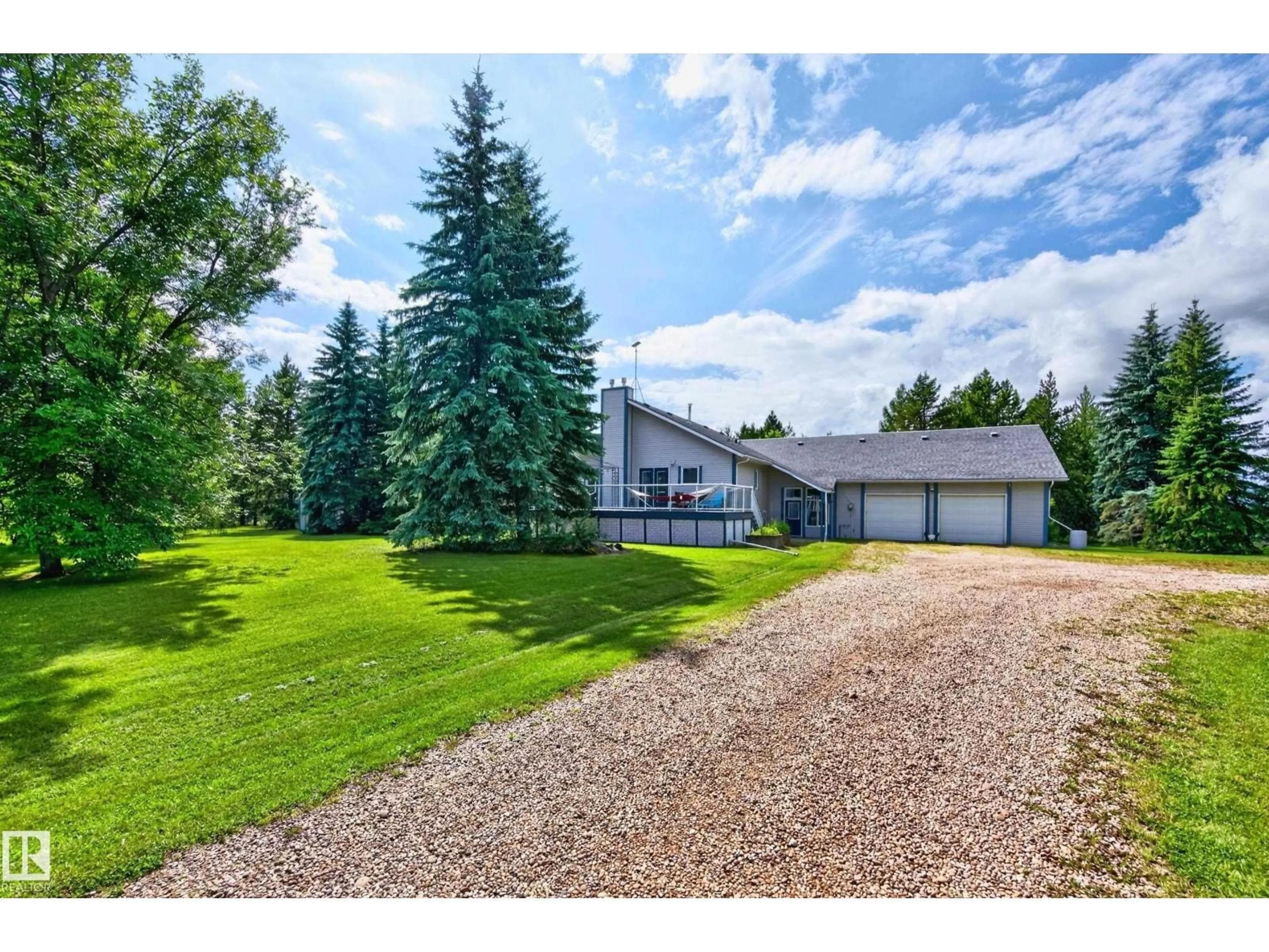 A pic from outside/outdoor area/front of a property/back of a property/a pic from drone, mountain view for 50354 RGE RD 235, Rural Leduc County Alberta T4X0M1