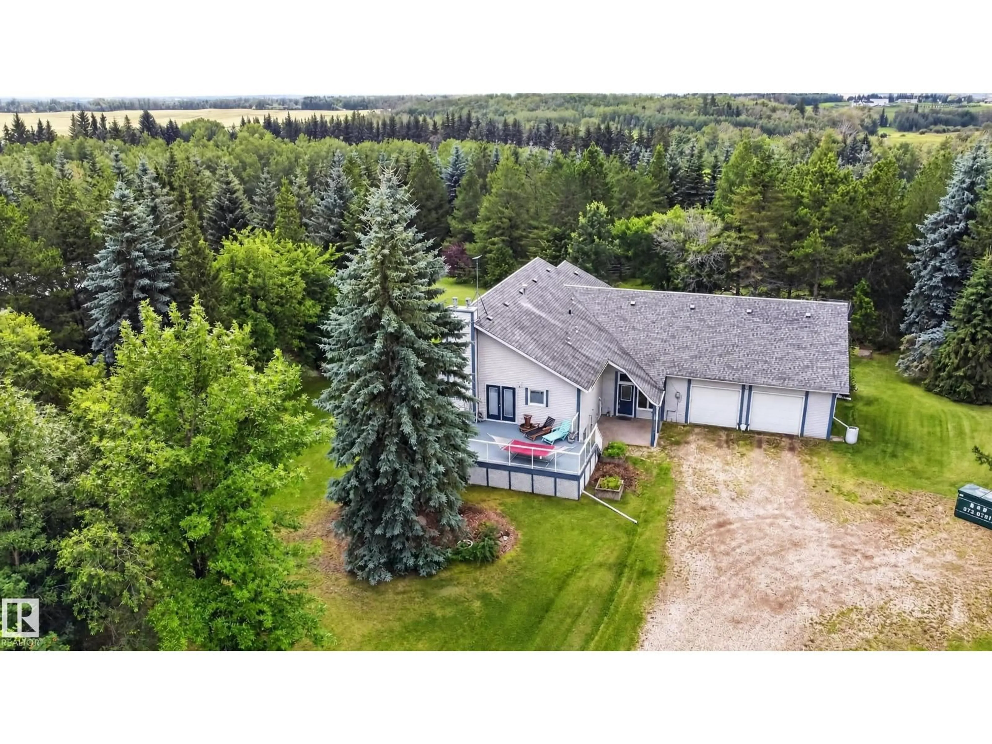 A pic from outside/outdoor area/front of a property/back of a property/a pic from drone, unknown for 50354 RGE RD 235, Rural Leduc County Alberta T4X0M1
