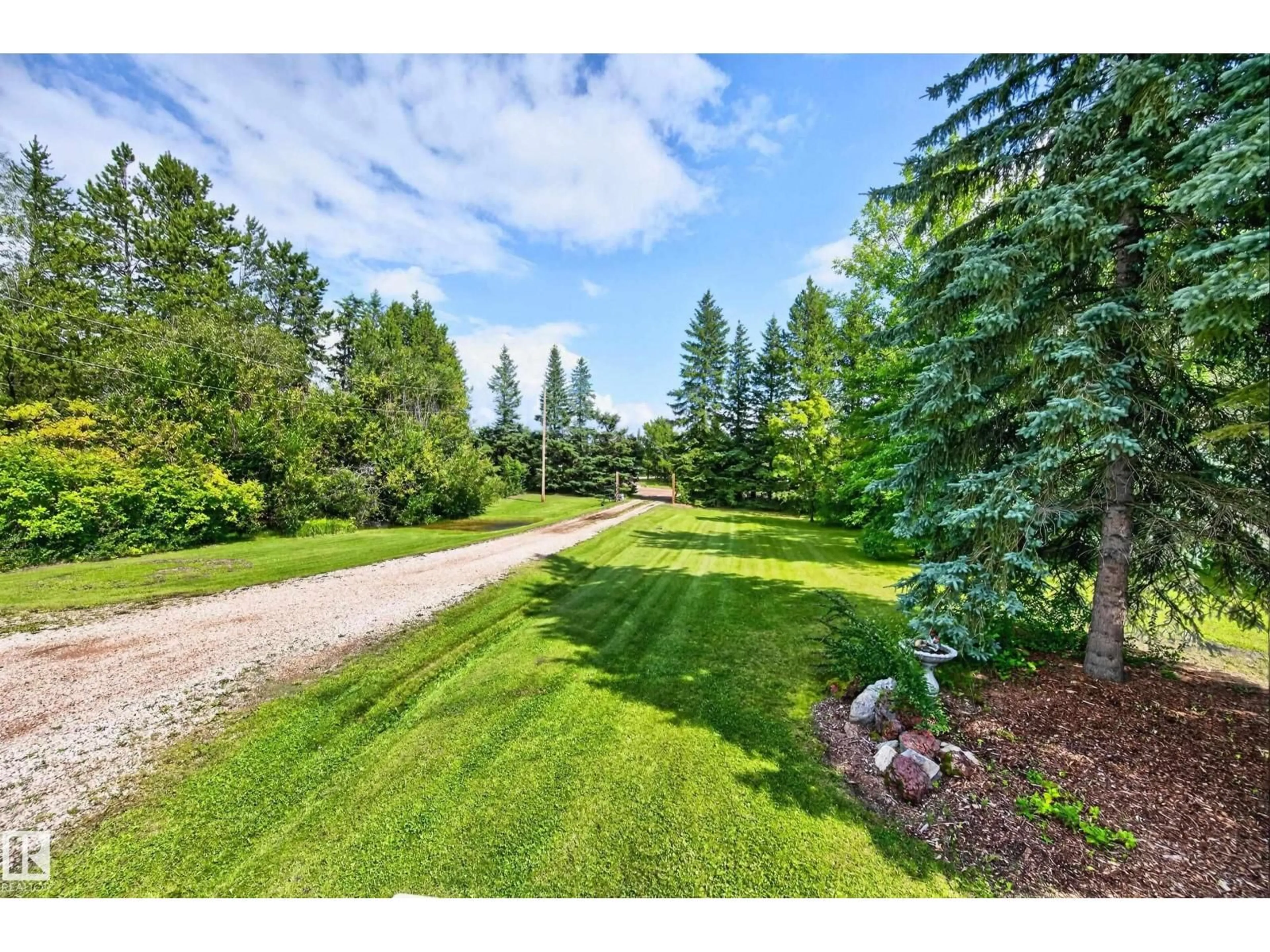 A pic from outside/outdoor area/front of a property/back of a property/a pic from drone, forest/trees view for 50354 RGE RD 235, Rural Leduc County Alberta T4X0M1
