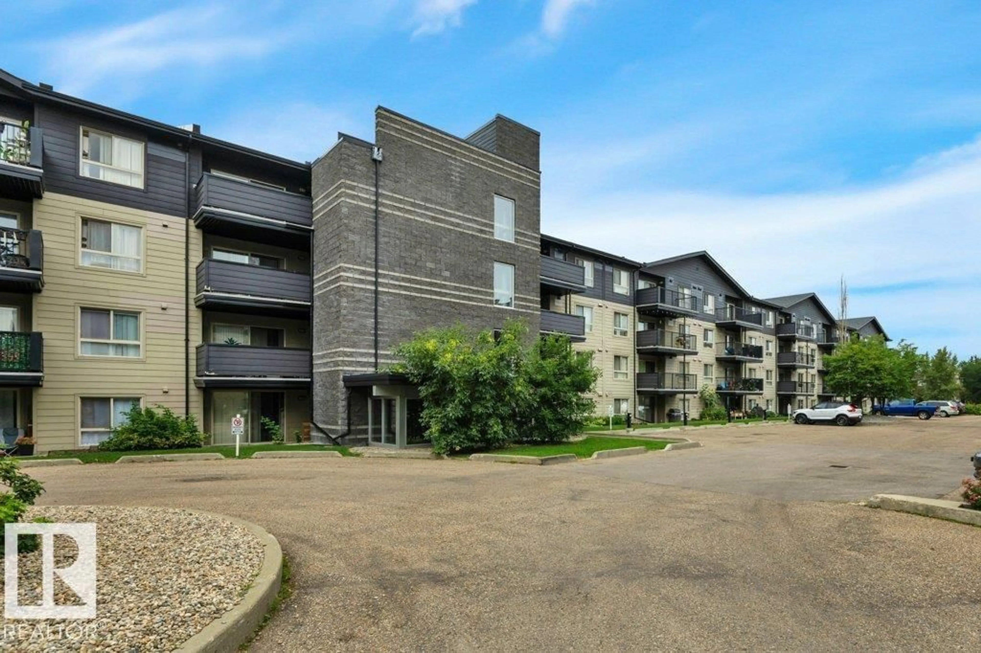 A pic from outside/outdoor area/front of a property/back of a property/a pic from drone, building for #122 - 17011 67 AV NW, Edmonton Alberta T5T6Y6