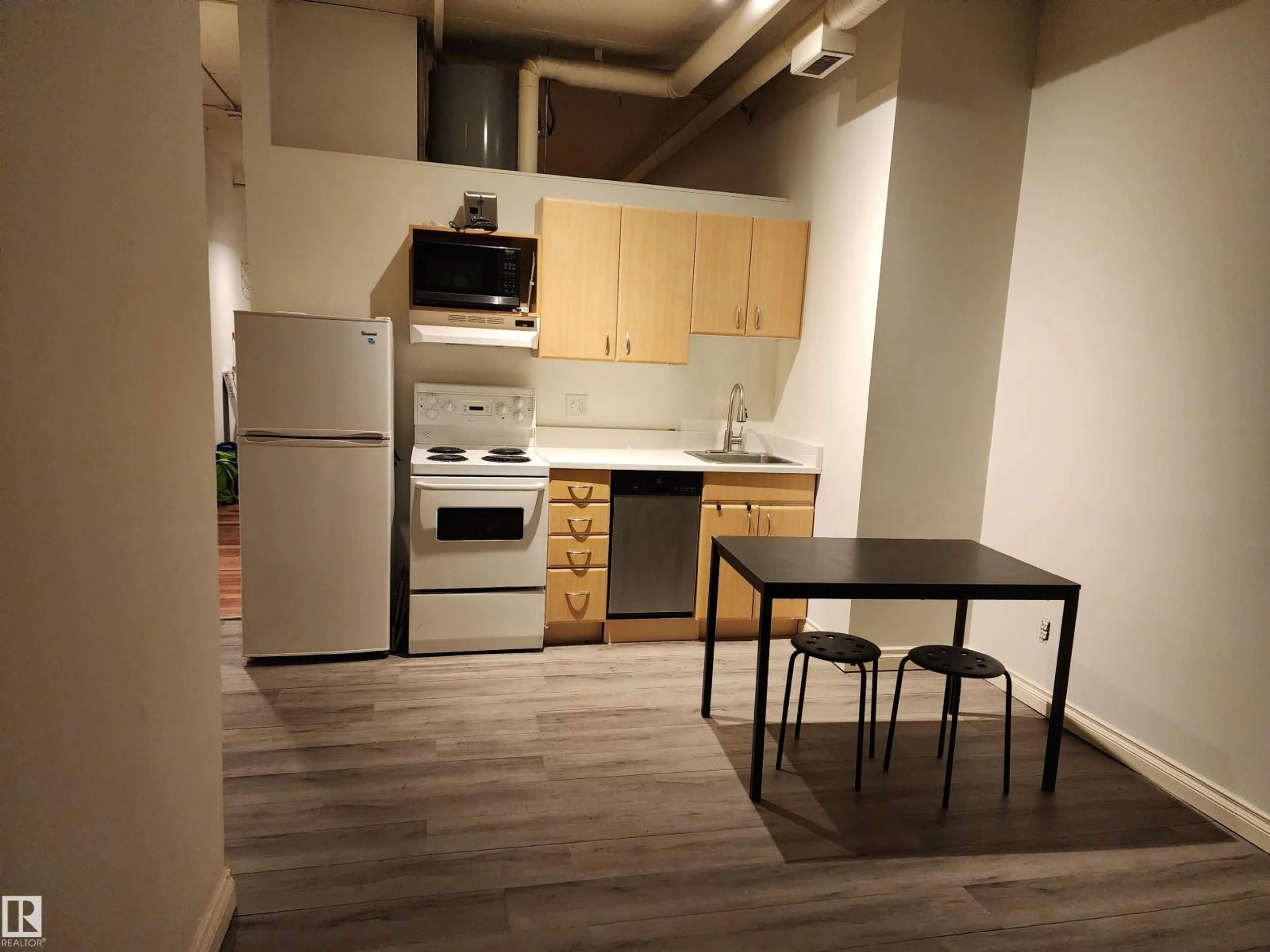 Standard kitchen, wood/laminate floor for 1002 - 10024 JASPER AV, Edmonton Alberta T5J1R9