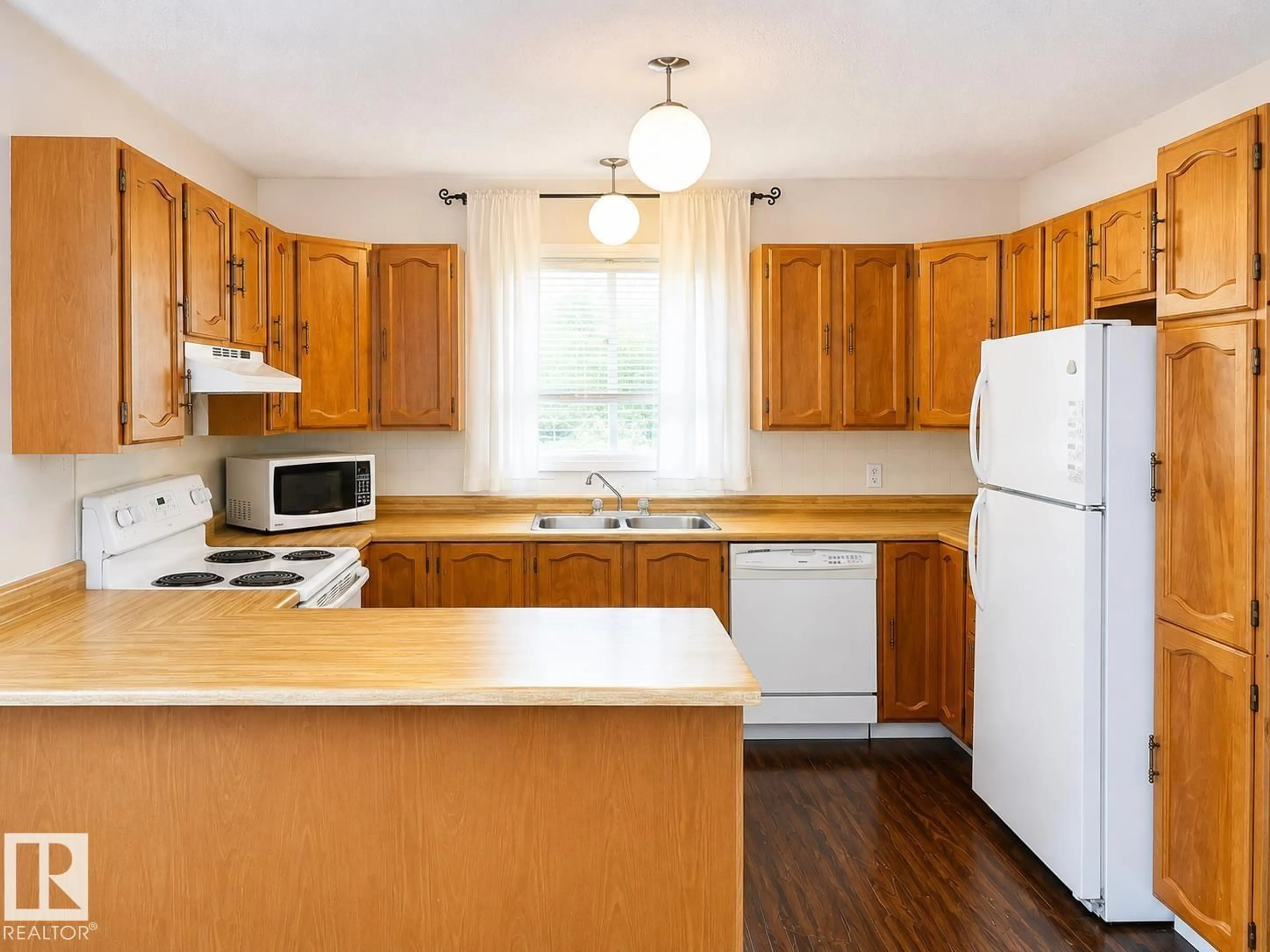 Standard kitchen, wood/laminate floor for 802 16 AV, Cold Lake Alberta T9M1L2
