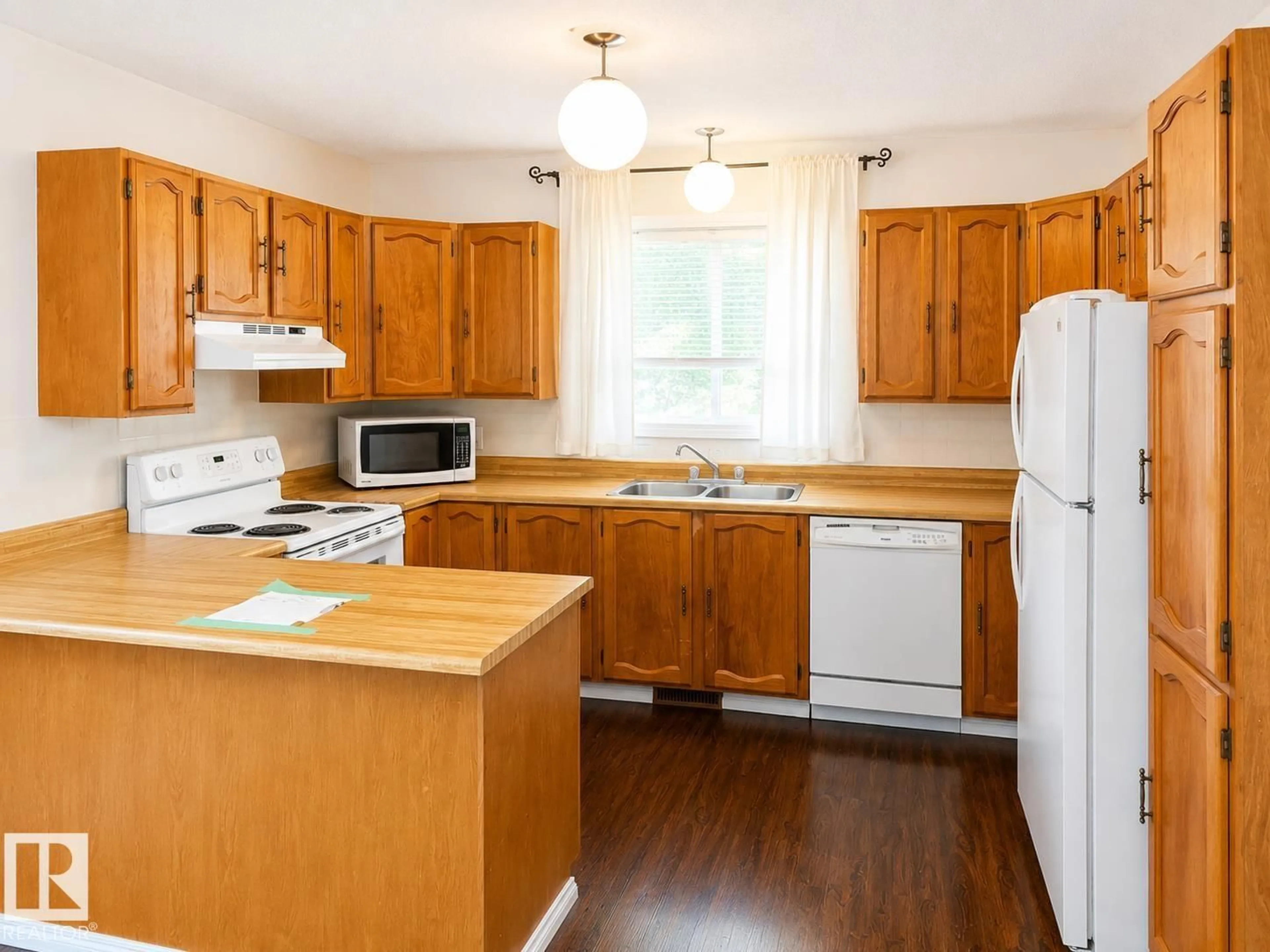 Standard kitchen, wood/laminate floor for 802 16 AV, Cold Lake Alberta T9M1L2